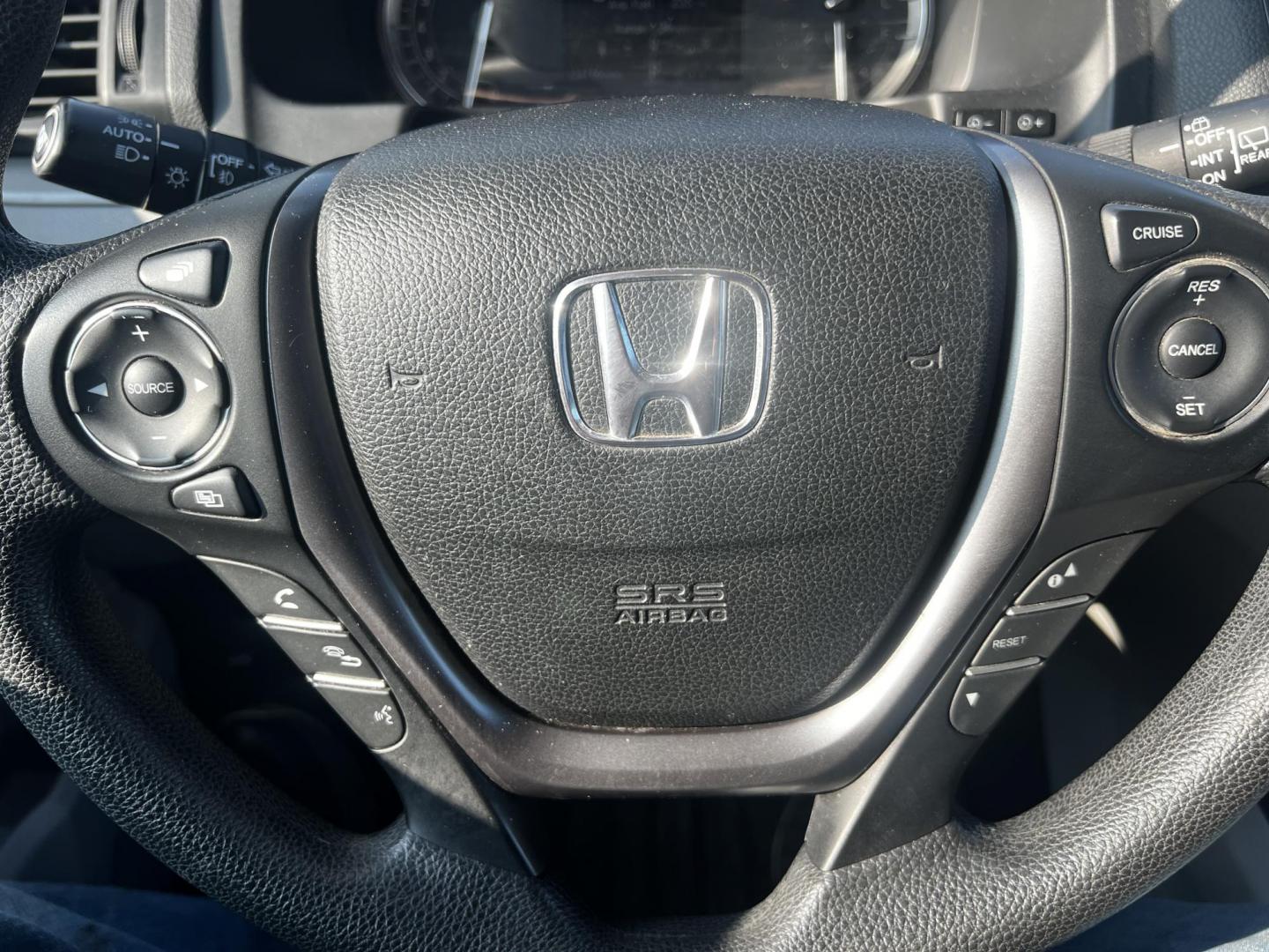 2017 Black /Gray Honda Pilot EX 4WD (5FNYF6H39HB) with an 3.5L V6 SOHC 24V engine, 6 Speed Auto transmission, located at 547 E. Main St., Orwell, OH, 44076, (440) 437-5893, 41.535435, -80.847855 - This 2017 Honda Pilot EX 4WD is a versatile and family-friendly SUV equipped with a 3.5L EarthDreams V6 engine and a 6-speed automatic transmission, offering a smooth driving experience and an efficient highway fuel economy of 26 MPG. It features LED daytime running lights and dusk-sensing headlight - Photo#9