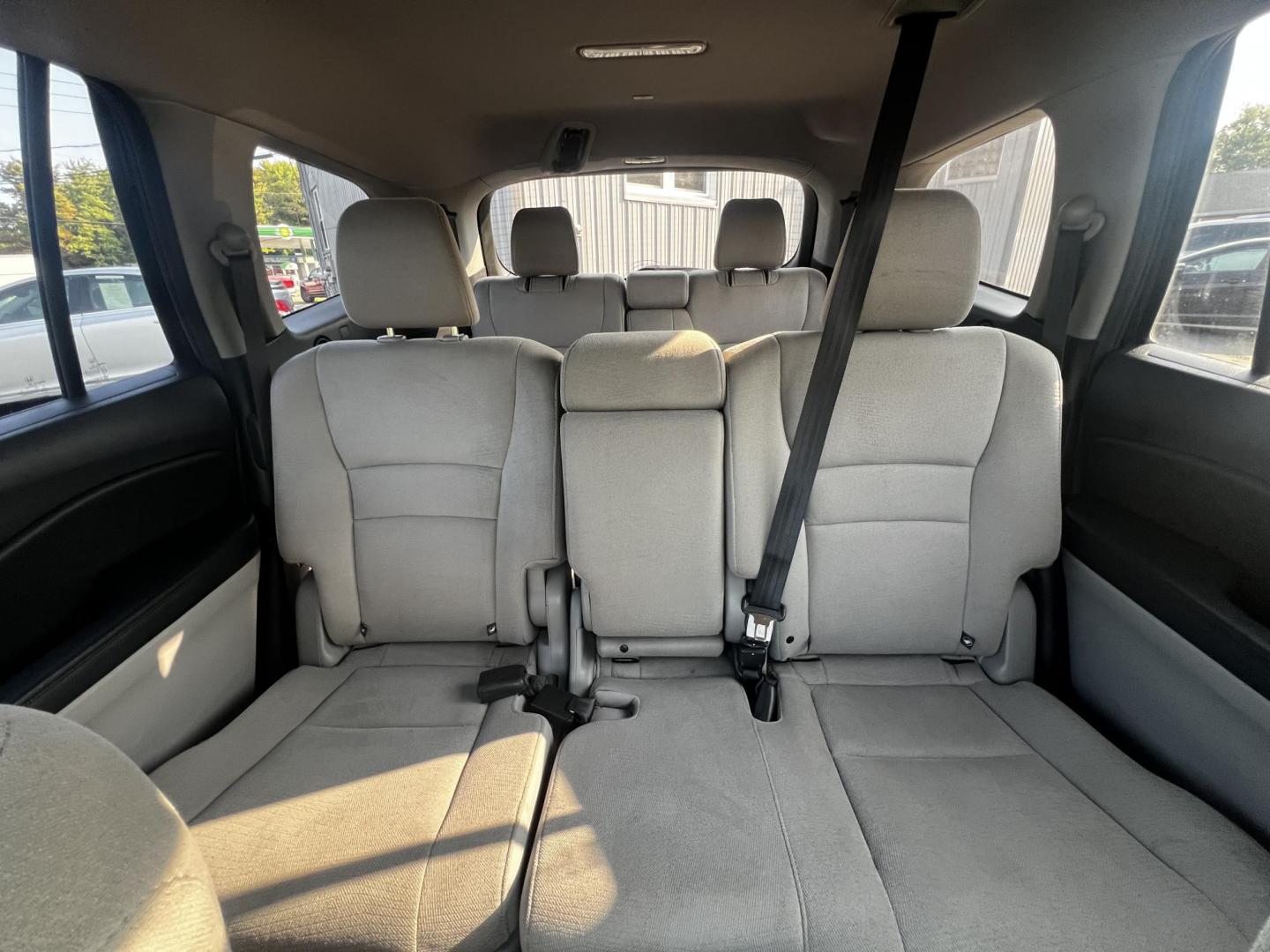 2017 Black /Gray Honda Pilot EX 4WD (5FNYF6H39HB) with an 3.5L V6 SOHC 24V engine, 6 Speed Auto transmission, located at 547 E. Main St., Orwell, OH, 44076, (440) 437-5893, 41.535435, -80.847855 - This 2017 Honda Pilot EX 4WD is a versatile and family-friendly SUV equipped with a 3.5L EarthDreams V6 engine and a 6-speed automatic transmission, offering a smooth driving experience and an efficient highway fuel economy of 26 MPG. It features LED daytime running lights and dusk-sensing headlight - Photo#13