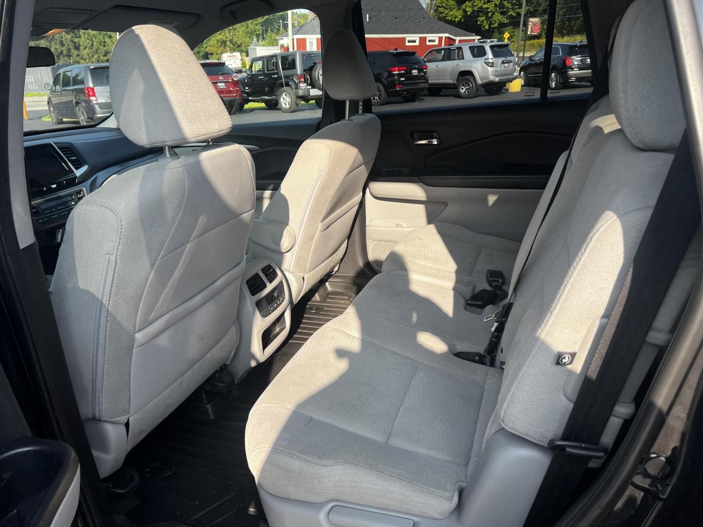 2017 Black /Gray Honda Pilot EX 4WD (5FNYF6H39HB) with an 3.5L V6 SOHC 24V engine, 6 Speed Auto transmission, located at 547 E. Main St., Orwell, OH, 44076, (440) 437-5893, 41.535435, -80.847855 - This 2017 Honda Pilot EX 4WD is a versatile and family-friendly SUV equipped with a 3.5L EarthDreams V6 engine and a 6-speed automatic transmission, offering a smooth driving experience and an efficient highway fuel economy of 26 MPG. It features LED daytime running lights and dusk-sensing headlight - Photo#32