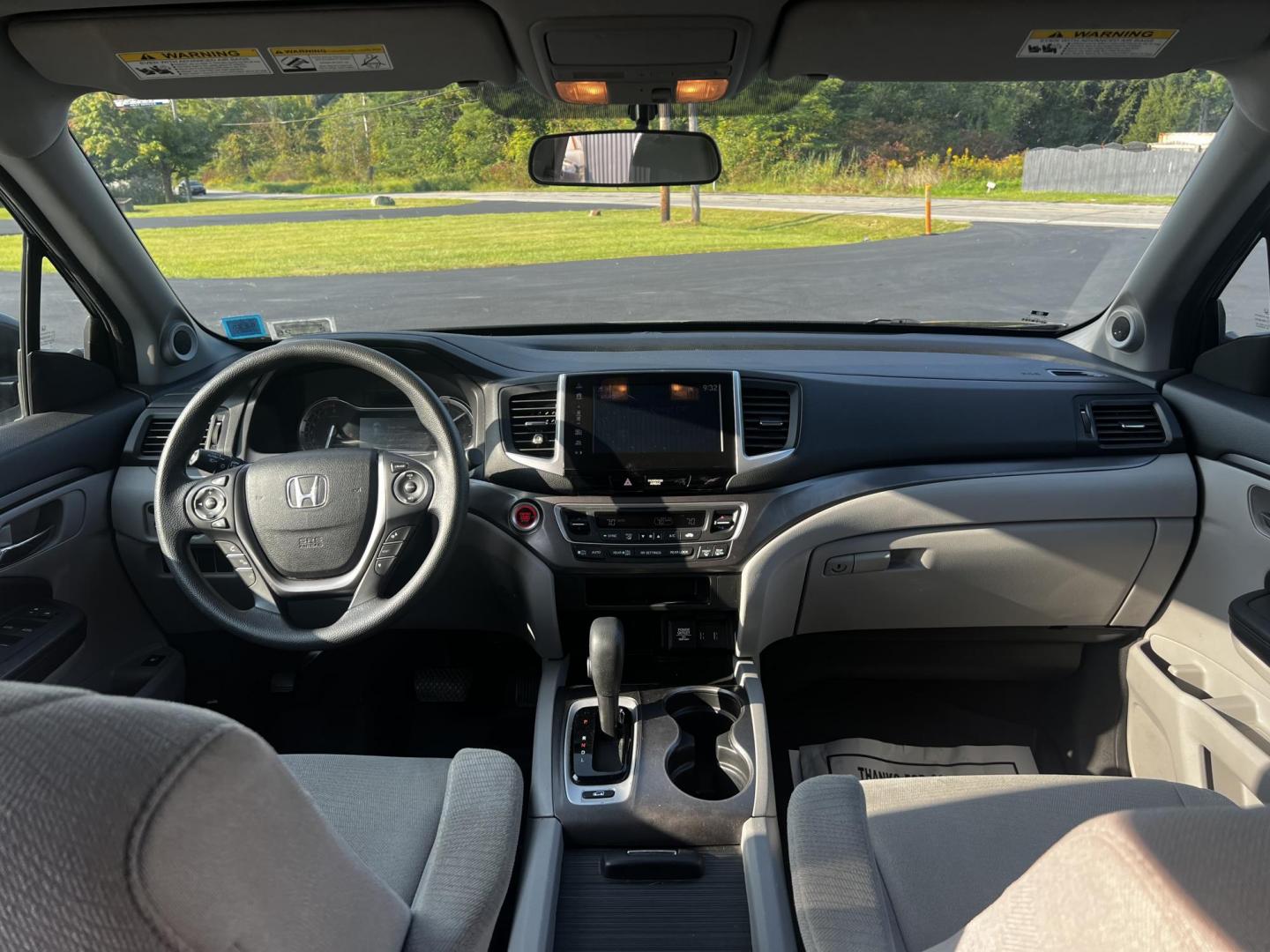 2017 Black /Gray Honda Pilot EX 4WD (5FNYF6H39HB) with an 3.5L V6 SOHC 24V engine, 6 Speed Auto transmission, located at 547 E. Main St., Orwell, OH, 44076, (440) 437-5893, 41.535435, -80.847855 - This 2017 Honda Pilot EX 4WD is a versatile and family-friendly SUV equipped with a 3.5L EarthDreams V6 engine and a 6-speed automatic transmission, offering a smooth driving experience and an efficient highway fuel economy of 26 MPG. It features LED daytime running lights and dusk-sensing headlight - Photo#12