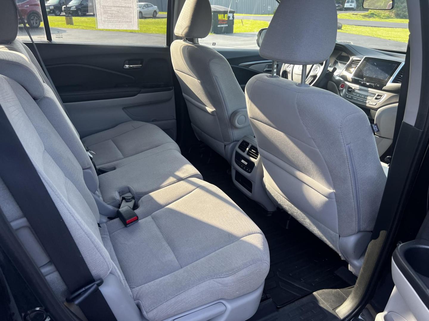 2017 Black /Gray Honda Pilot EX 4WD (5FNYF6H39HB) with an 3.5L V6 SOHC 24V engine, 6 Speed Auto transmission, located at 547 E. Main St., Orwell, OH, 44076, (440) 437-5893, 41.535435, -80.847855 - This 2017 Honda Pilot EX 4WD is a versatile and family-friendly SUV equipped with a 3.5L EarthDreams V6 engine and a 6-speed automatic transmission, offering a smooth driving experience and an efficient highway fuel economy of 26 MPG. It features LED daytime running lights and dusk-sensing headlight - Photo#36