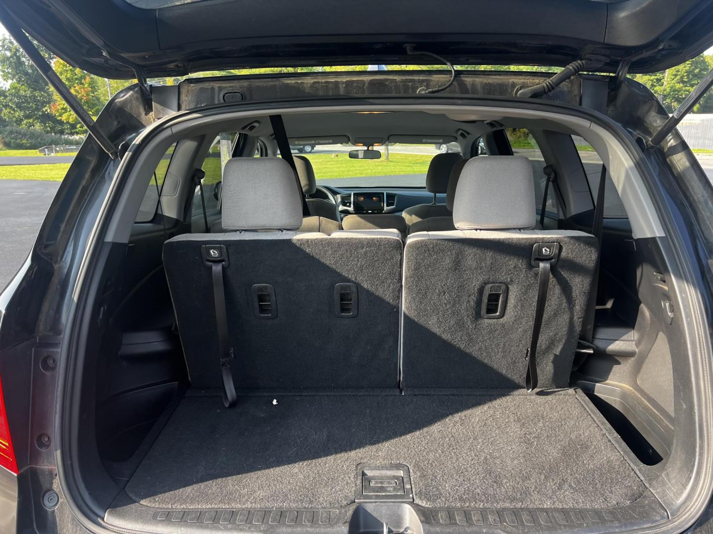 2017 Black /Gray Honda Pilot EX 4WD (5FNYF6H39HB) with an 3.5L V6 SOHC 24V engine, 6 Speed Auto transmission, located at 547 E. Main St., Orwell, OH, 44076, (440) 437-5893, 41.535435, -80.847855 - This 2017 Honda Pilot EX 4WD is a versatile and family-friendly SUV equipped with a 3.5L EarthDreams V6 engine and a 6-speed automatic transmission, offering a smooth driving experience and an efficient highway fuel economy of 26 MPG. It features LED daytime running lights and dusk-sensing headlight - Photo#35