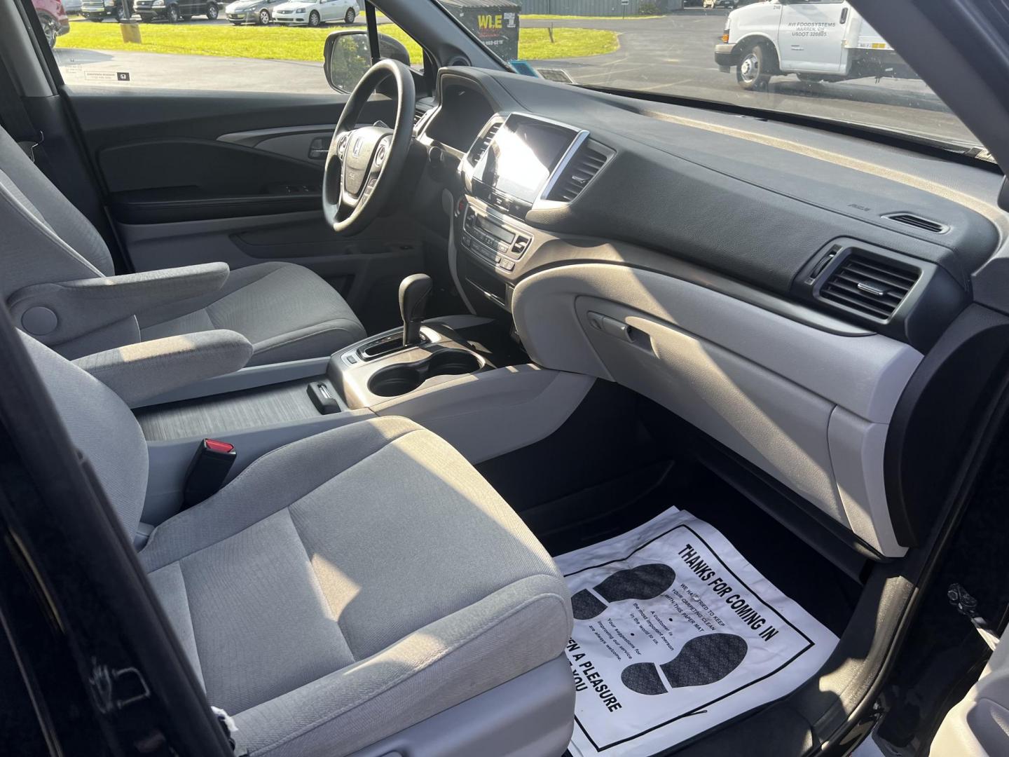 2017 Black /Gray Honda Pilot EX 4WD (5FNYF6H39HB) with an 3.5L V6 SOHC 24V engine, 6 Speed Auto transmission, located at 547 E. Main St., Orwell, OH, 44076, (440) 437-5893, 41.535435, -80.847855 - This 2017 Honda Pilot EX 4WD is a versatile and family-friendly SUV equipped with a 3.5L EarthDreams V6 engine and a 6-speed automatic transmission, offering a smooth driving experience and an efficient highway fuel economy of 26 MPG. It features LED daytime running lights and dusk-sensing headlight - Photo#38