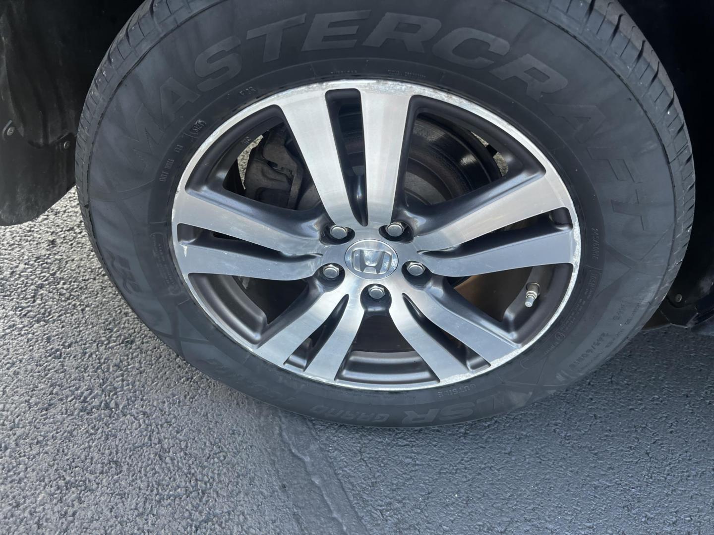 2017 Black /Gray Honda Pilot EX 4WD (5FNYF6H39HB) with an 3.5L V6 SOHC 24V engine, 6 Speed Auto transmission, located at 547 E. Main St., Orwell, OH, 44076, (440) 437-5893, 41.535435, -80.847855 - This 2017 Honda Pilot EX 4WD is a versatile and family-friendly SUV equipped with a 3.5L EarthDreams V6 engine and a 6-speed automatic transmission, offering a smooth driving experience and an efficient highway fuel economy of 26 MPG. It features LED daytime running lights and dusk-sensing headlight - Photo#22
