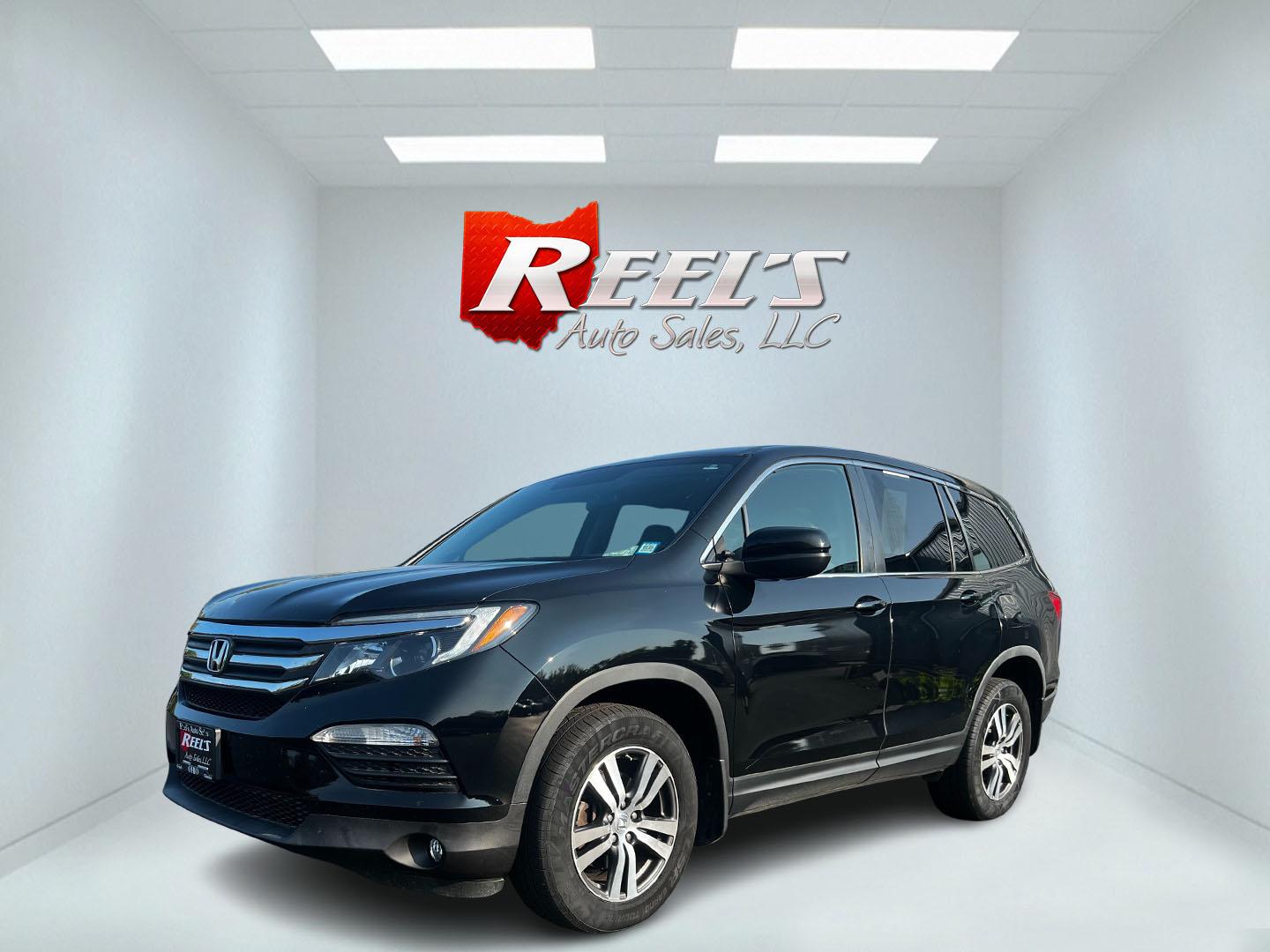 2017 Black /Gray Honda Pilot EX 4WD (5FNYF6H39HB) with an 3.5L V6 SOHC 24V engine, 6 Speed Auto transmission, located at 547 E. Main St., Orwell, OH, 44076, (440) 437-5893, 41.535435, -80.847855 - This 2017 Honda Pilot EX 4WD is a versatile and family-friendly SUV equipped with a 3.5L EarthDreams V6 engine and a 6-speed automatic transmission, offering a smooth driving experience and an efficient highway fuel economy of 26 MPG. It features LED daytime running lights and dusk-sensing headlight - Photo#0