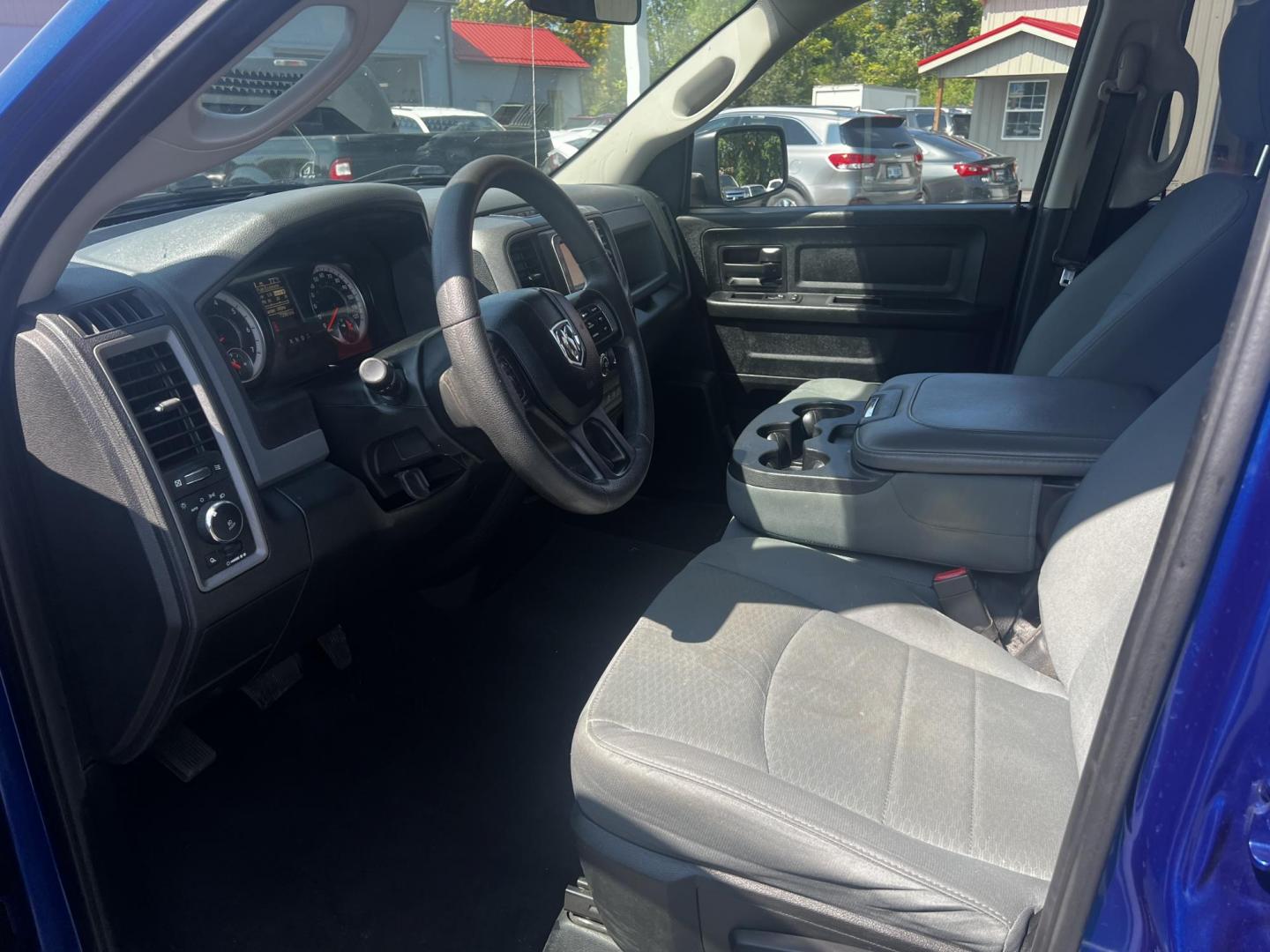 2018 Blue /Black RAM 1500 Express Quad Cab 4WD (1C6RR7FT4JS) with an 5.7L V8 OHV 16V engine, 8A transmission, located at 547 E. Main St., Orwell, OH, 44076, (440) 437-5893, 41.535435, -80.847855 - This 2018 Ram 1500 Express Quad Cab 4WD is a robust pickup truck powered by a 5.7L HEMI V8 engine, delivering 395 horsepower and paired with an 8-speed automatic transmission. This combination ensures strong performance and an 8,000-pound towing capacity, suitable for both work and recreational need - Photo#15