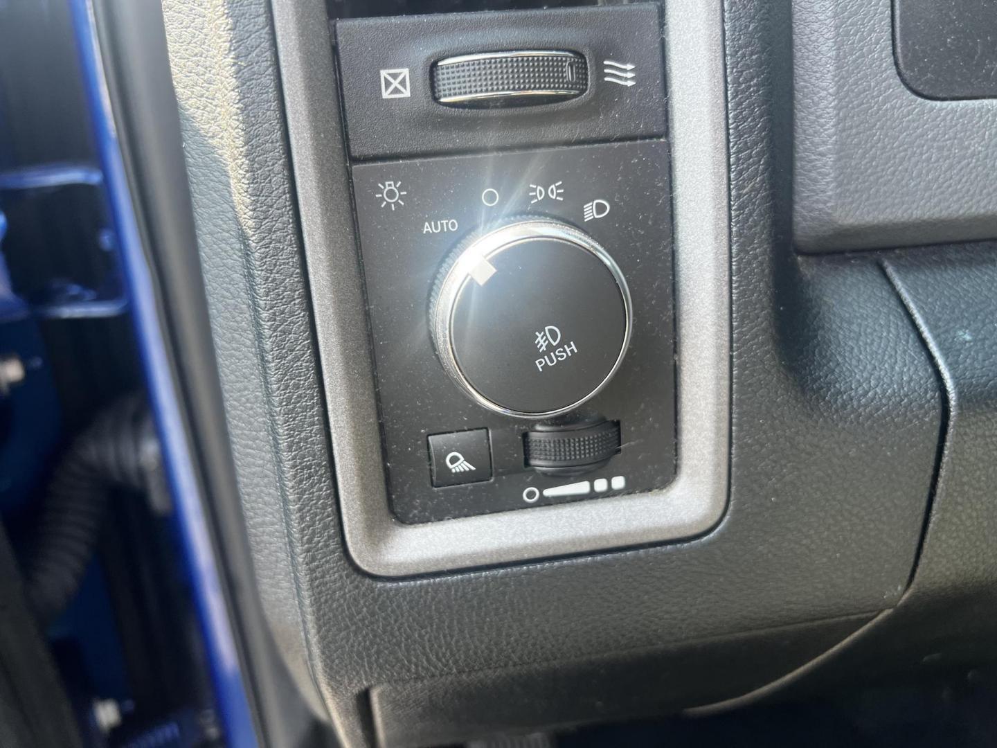 2018 Blue /Black RAM 1500 Express Quad Cab 4WD (1C6RR7FT4JS) with an 5.7L V8 OHV 16V engine, 8A transmission, located at 547 E. Main St., Orwell, OH, 44076, (440) 437-5893, 41.535435, -80.847855 - This 2018 Ram 1500 Express Quad Cab 4WD is a robust pickup truck powered by a 5.7L HEMI V8 engine, delivering 395 horsepower and paired with an 8-speed automatic transmission. This combination ensures strong performance and an 8,000-pound towing capacity, suitable for both work and recreational need - Photo#19
