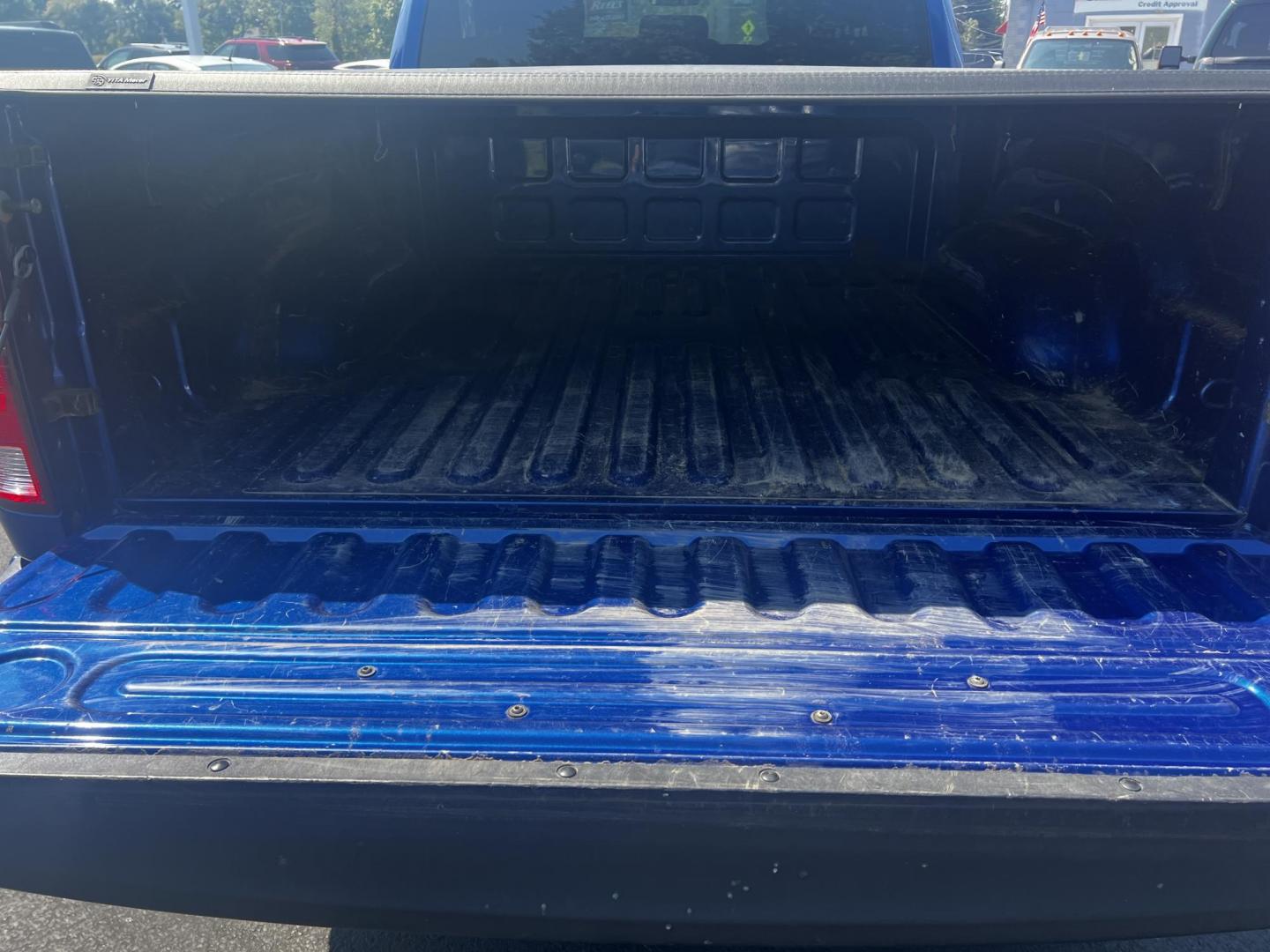 2018 Blue /Black RAM 1500 Express Quad Cab 4WD (1C6RR7FT4JS) with an 5.7L V8 OHV 16V engine, 8A transmission, located at 547 E. Main St., Orwell, OH, 44076, (440) 437-5893, 41.535435, -80.847855 - This 2018 Ram 1500 Express Quad Cab 4WD is a robust pickup truck powered by a 5.7L HEMI V8 engine, delivering 395 horsepower and paired with an 8-speed automatic transmission. This combination ensures strong performance and an 8,000-pound towing capacity, suitable for both work and recreational need - Photo#28