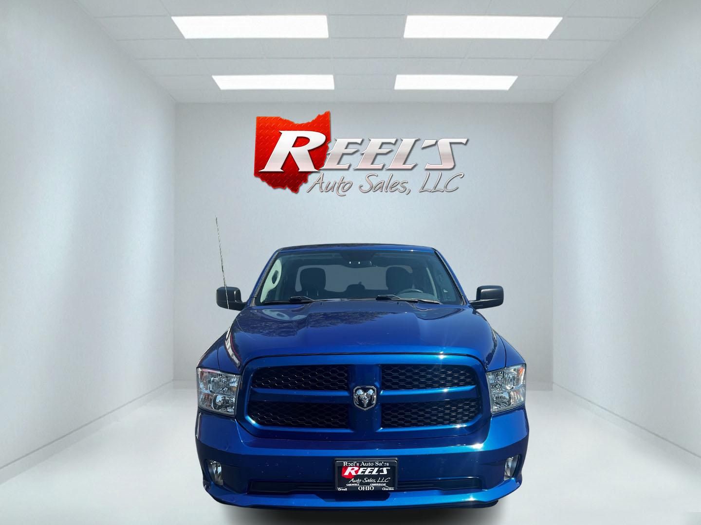 2018 Blue /Black RAM 1500 Express Quad Cab 4WD (1C6RR7FT4JS) with an 5.7L V8 OHV 16V engine, 8A transmission, located at 547 E. Main St., Orwell, OH, 44076, (440) 437-5893, 41.535435, -80.847855 - This 2018 Ram 1500 Express Quad Cab 4WD is a robust pickup truck powered by a 5.7L HEMI V8 engine, delivering 395 horsepower and paired with an 8-speed automatic transmission. This combination ensures strong performance and an 8,000-pound towing capacity, suitable for both work and recreational need - Photo#1