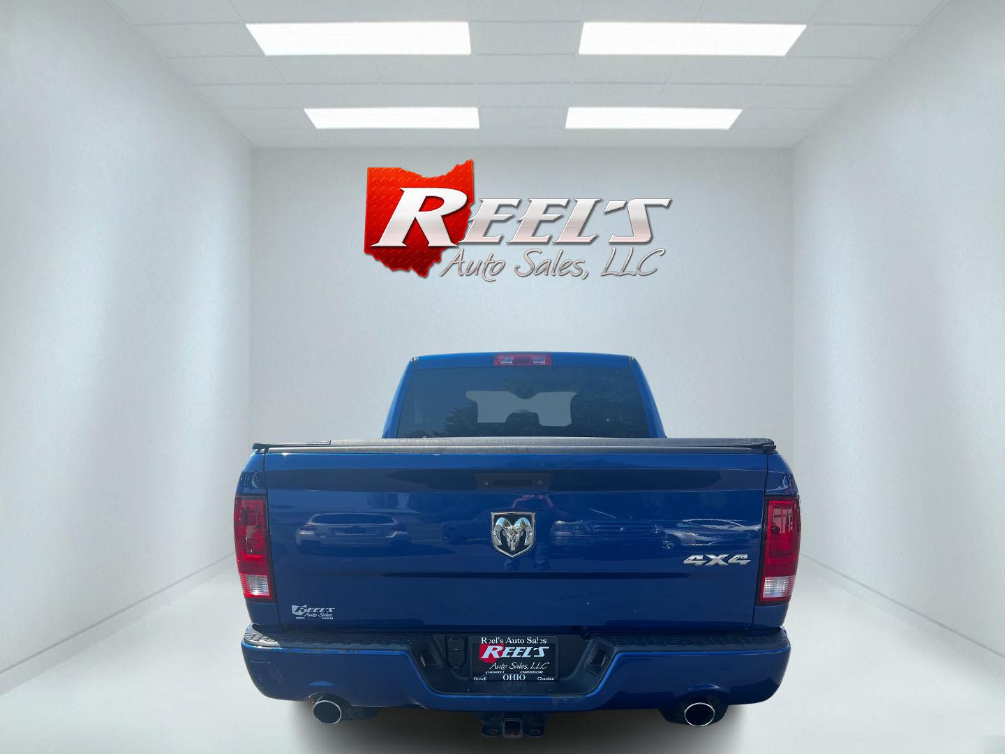 2018 Blue /Black RAM 1500 Express Quad Cab 4WD (1C6RR7FT4JS) with an 5.7L V8 OHV 16V engine, 8A transmission, located at 547 E. Main St., Orwell, OH, 44076, (440) 437-5893, 41.535435, -80.847855 - This 2018 Ram 1500 Express Quad Cab 4WD is a robust pickup truck powered by a 5.7L HEMI V8 engine, delivering 395 horsepower and paired with an 8-speed automatic transmission. This combination ensures strong performance and an 8,000-pound towing capacity, suitable for both work and recreational need - Photo#6
