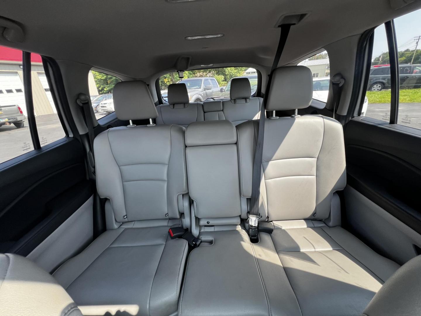 2016 Silver /Gray Honda Pilot EXL 4WD (5FNYF6H55GB) with an 3.5L V6 SOHC 24V engine, 6-Speed Automatic transmission, located at 547 E. Main St., Orwell, OH, 44076, (440) 437-5893, 41.535435, -80.847855 - This One Owner 2016 Honda Pilot EXL AWD is a well-equipped SUV designed for both comfort and versatility. It features a 3.5L EarthDreams V6 engine with a 6-speed automatic transmission, providing smooth power delivery and reliable AWD performance. The interior is luxurious with leather seating and p - Photo#32