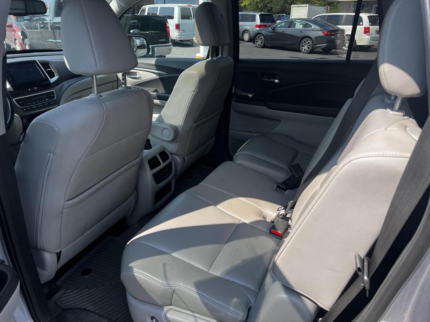 2016 Silver /Gray Honda Pilot EXL 4WD (5FNYF6H55GB) with an 3.5L V6 SOHC 24V engine, 6-Speed Automatic transmission, located at 547 E. Main St., Orwell, OH, 44076, (440) 437-5893, 41.535435, -80.847855 - This One Owner 2016 Honda Pilot EXL AWD is a well-equipped SUV designed for both comfort and versatility. It features a 3.5L EarthDreams V6 engine with a 6-speed automatic transmission, providing smooth power delivery and reliable AWD performance. The interior is luxurious with leather seating and p - Photo#34