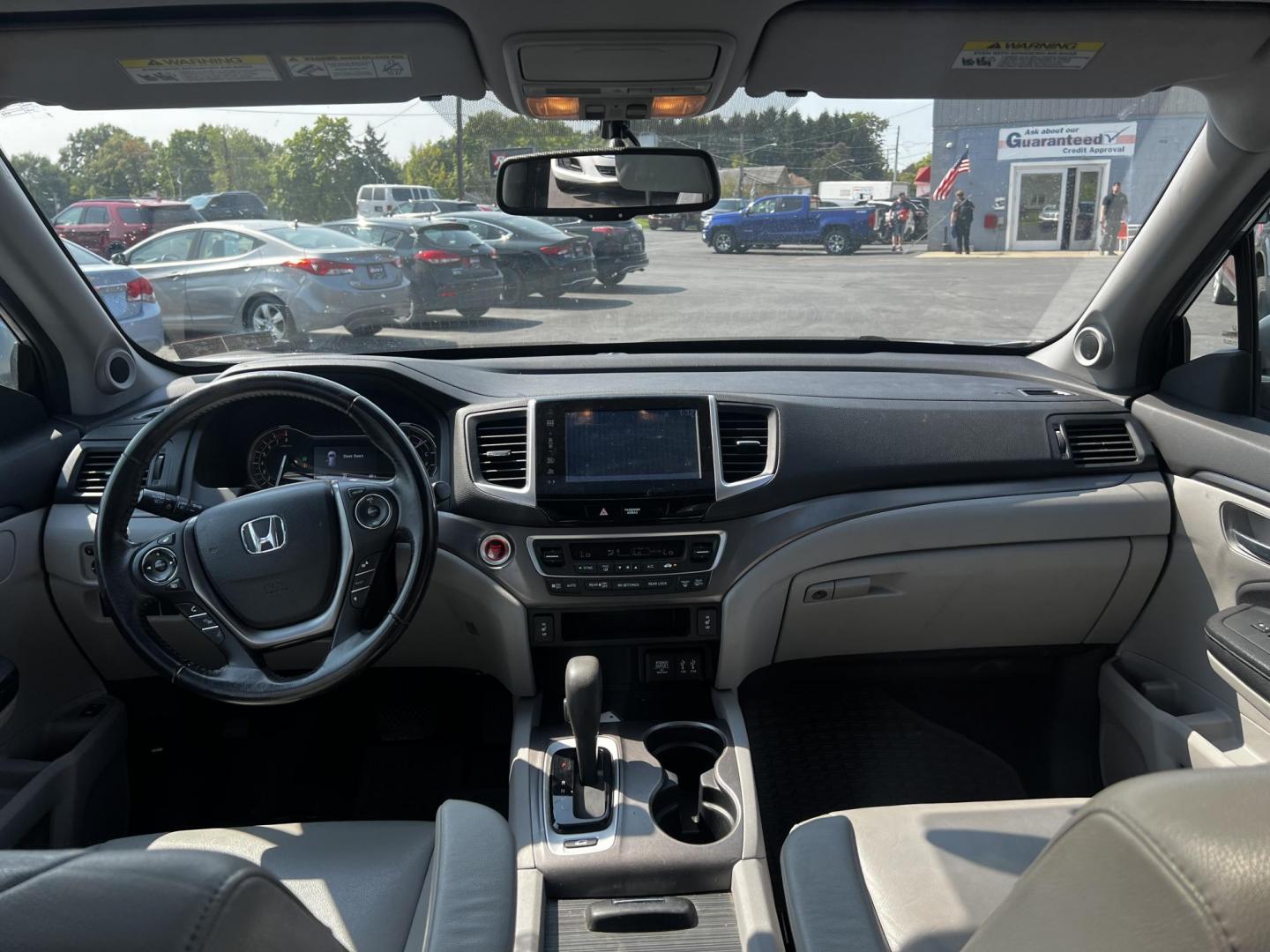 2016 Silver /Gray Honda Pilot EXL 4WD (5FNYF6H55GB) with an 3.5L V6 SOHC 24V engine, 6-Speed Automatic transmission, located at 547 E. Main St., Orwell, OH, 44076, (440) 437-5893, 41.535435, -80.847855 - This One Owner 2016 Honda Pilot EXL AWD is a well-equipped SUV designed for both comfort and versatility. It features a 3.5L EarthDreams V6 engine with a 6-speed automatic transmission, providing smooth power delivery and reliable AWD performance. The interior is luxurious with leather seating and p - Photo#36