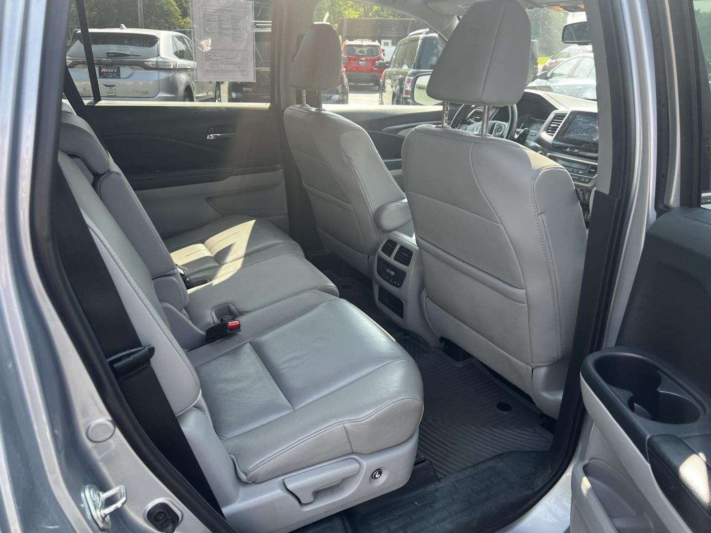 2016 Silver /Gray Honda Pilot EXL 4WD (5FNYF6H55GB) with an 3.5L V6 SOHC 24V engine, 6-Speed Automatic transmission, located at 547 E. Main St., Orwell, OH, 44076, (440) 437-5893, 41.535435, -80.847855 - This One Owner 2016 Honda Pilot EXL AWD is a well-equipped SUV designed for both comfort and versatility. It features a 3.5L EarthDreams V6 engine with a 6-speed automatic transmission, providing smooth power delivery and reliable AWD performance. The interior is luxurious with leather seating and p - Photo#40