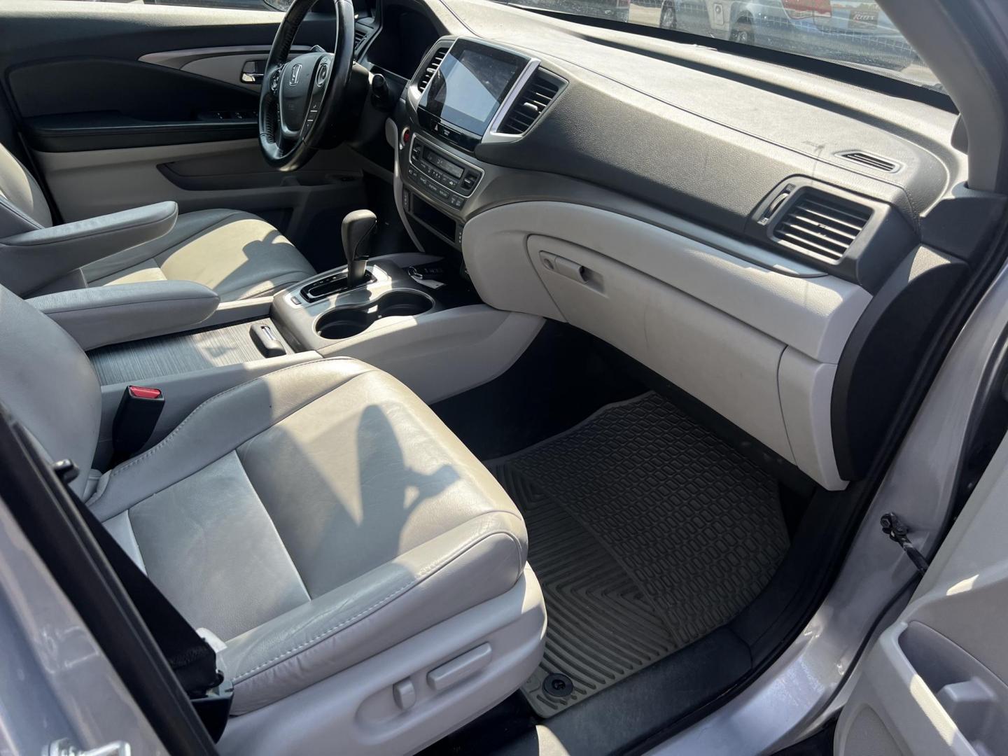 2016 Silver /Gray Honda Pilot EXL 4WD (5FNYF6H55GB) with an 3.5L V6 SOHC 24V engine, 6-Speed Automatic transmission, located at 547 E. Main St., Orwell, OH, 44076, (440) 437-5893, 41.535435, -80.847855 - This One Owner 2016 Honda Pilot EXL AWD is a well-equipped SUV designed for both comfort and versatility. It features a 3.5L EarthDreams V6 engine with a 6-speed automatic transmission, providing smooth power delivery and reliable AWD performance. The interior is luxurious with leather seating and p - Photo#41