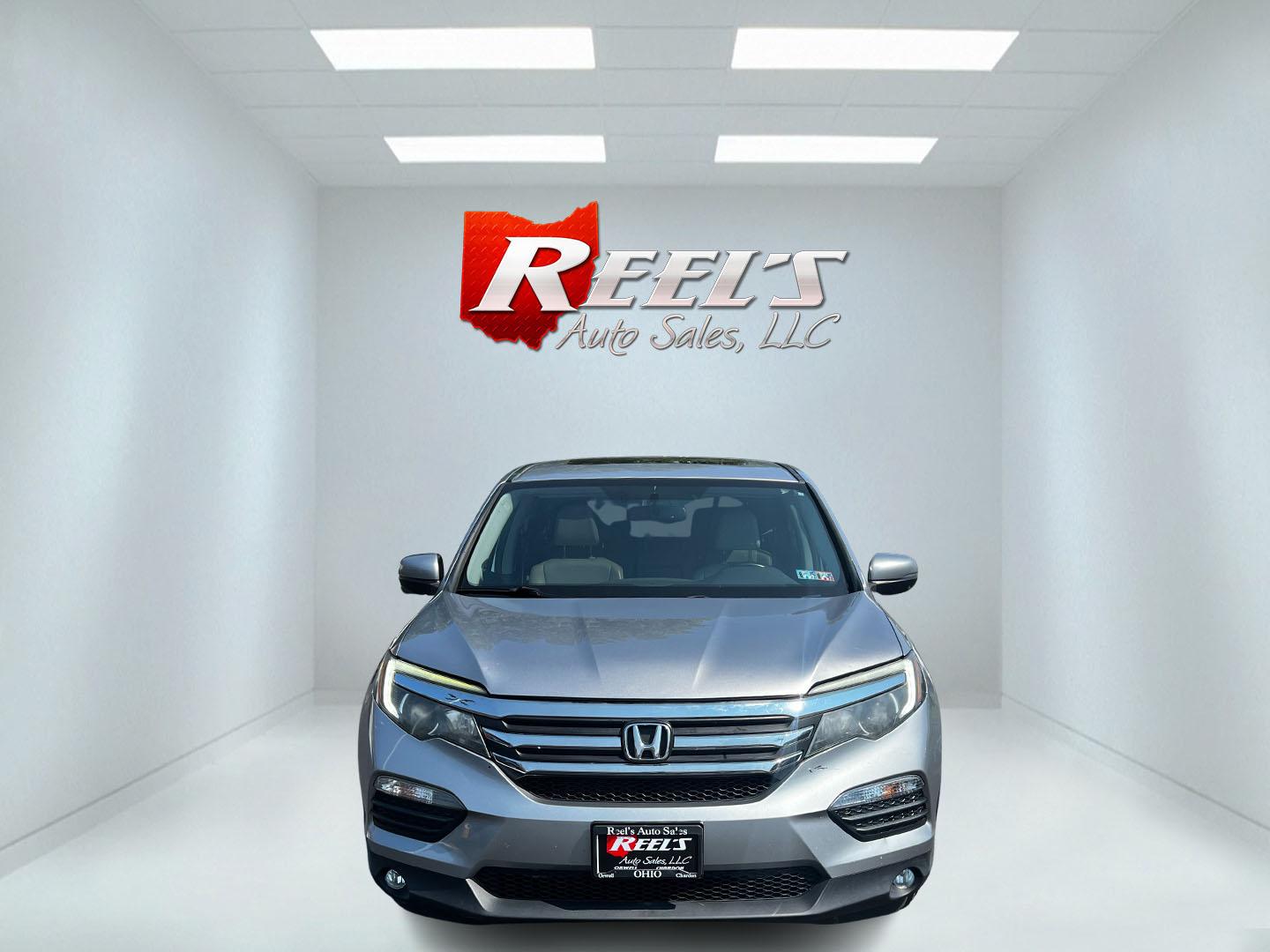2016 Silver /Gray Honda Pilot EXL 4WD (5FNYF6H55GB) with an 3.5L V6 SOHC 24V engine, 6-Speed Automatic transmission, located at 547 E. Main St., Orwell, OH, 44076, (440) 437-5893, 41.535435, -80.847855 - This One Owner 2016 Honda Pilot EXL AWD is a well-equipped SUV designed for both comfort and versatility. It features a 3.5L EarthDreams V6 engine with a 6-speed automatic transmission, providing smooth power delivery and reliable AWD performance. The interior is luxurious with leather seating and p - Photo#1