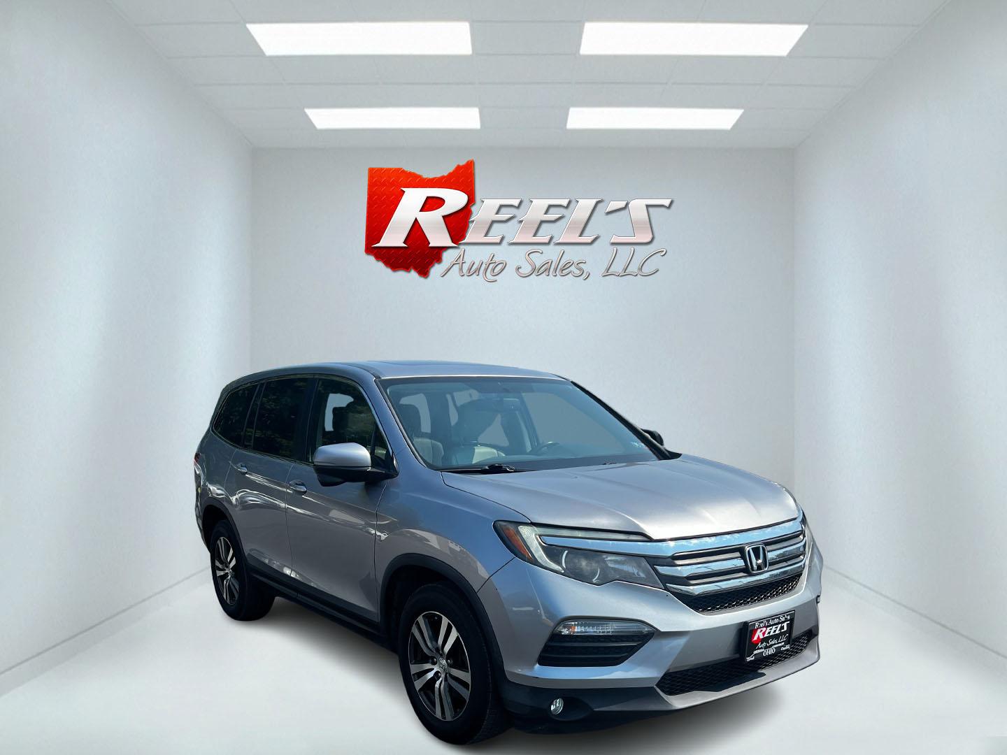 2016 Silver /Gray Honda Pilot EXL 4WD (5FNYF6H55GB) with an 3.5L V6 SOHC 24V engine, 6-Speed Automatic transmission, located at 547 E. Main St., Orwell, OH, 44076, (440) 437-5893, 41.535435, -80.847855 - This One Owner 2016 Honda Pilot EXL AWD is a well-equipped SUV designed for both comfort and versatility. It features a 3.5L EarthDreams V6 engine with a 6-speed automatic transmission, providing smooth power delivery and reliable AWD performance. The interior is luxurious with leather seating and p - Photo#2