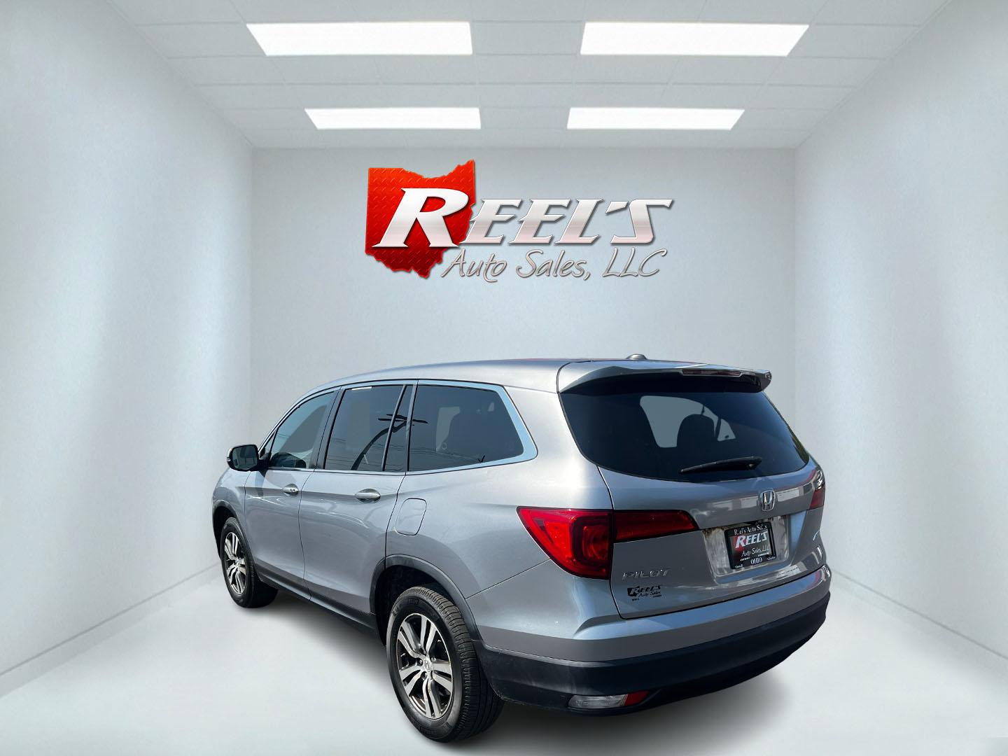 2016 Silver /Gray Honda Pilot EXL 4WD (5FNYF6H55GB) with an 3.5L V6 SOHC 24V engine, 6-Speed Automatic transmission, located at 547 E. Main St., Orwell, OH, 44076, (440) 437-5893, 41.535435, -80.847855 - This One Owner 2016 Honda Pilot EXL AWD is a well-equipped SUV designed for both comfort and versatility. It features a 3.5L EarthDreams V6 engine with a 6-speed automatic transmission, providing smooth power delivery and reliable AWD performance. The interior is luxurious with leather seating and p - Photo#7