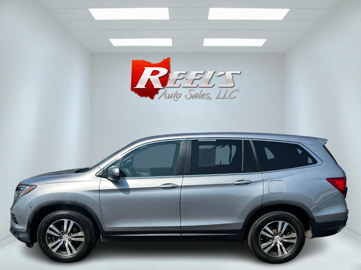 2016 Silver /Gray Honda Pilot EXL 4WD (5FNYF6H55GB) with an 3.5L V6 SOHC 24V engine, 6-Speed Automatic transmission, located at 547 E. Main St., Orwell, OH, 44076, (440) 437-5893, 41.535435, -80.847855 - This One Owner 2016 Honda Pilot EXL AWD is a well-equipped SUV designed for both comfort and versatility. It features a 3.5L EarthDreams V6 engine with a 6-speed automatic transmission, providing smooth power delivery and reliable AWD performance. The interior is luxurious with leather seating and p - Photo#8
