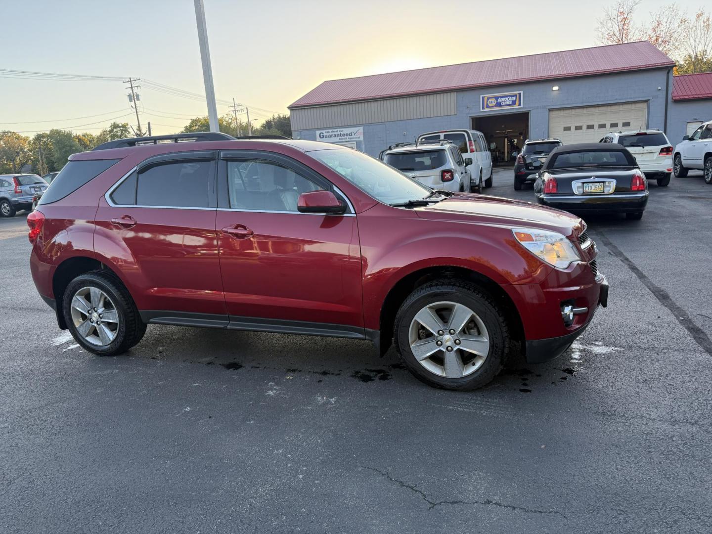 2014 Red /Gray Chevrolet Equinox 2LT AWD (2GNFLGE39E6) with an 3.6L V6 DOHC 24V engine, 6-Speed Automatic transmission, located at 547 E. Main St., Orwell, OH, 44076, (440) 437-5893, 41.535435, -80.847855 - 2014 Chevrolet Equinox 2LT AWD – Loaded, Versatile, and Ready for Any Road! Enjoy comfort, capability, and convenience in this well-equipped 2014 Chevrolet Equinox 2LT AWD. Powered by a strong 3.6L V6 engine and a smooth 6-speed automatic transmission, this Equinox delivers confident performance - Photo#3