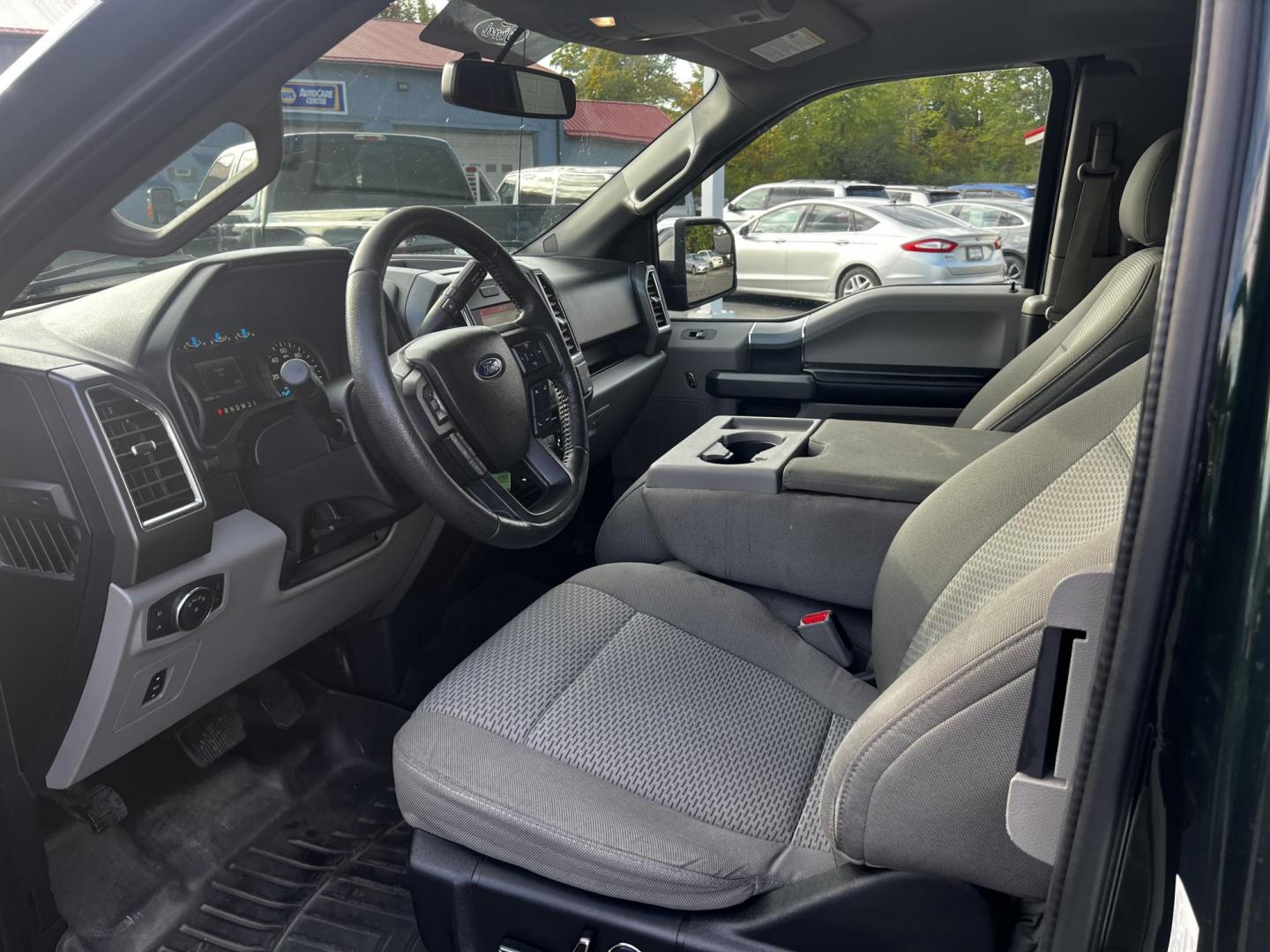 2016 Green /Gray Ford F-150 XLT SuperCab 6.5-ft. 4WD (1FTFX1EG1GF) with an 3.5L V6 DOHC 24V TWIN TURBO engine, 6 Speed Auto transmission, located at 11115 Chardon Rd. , Chardon, OH, 44024, (440) 214-9705, 41.580246, -81.241943 - This 2016 Ford F-150 XLT SuperCab 4WD is a powerhouse in the pickup truck segment, equipped with a 3.5-liter Twin Turbo EcoBoost V6 engine that produces 365 horsepower and 420 lb-ft of torque, enabling a 0-60 mph time of just 5.8 seconds and towing capacity of up to 10,600 pounds. Complemented by a - Photo#18