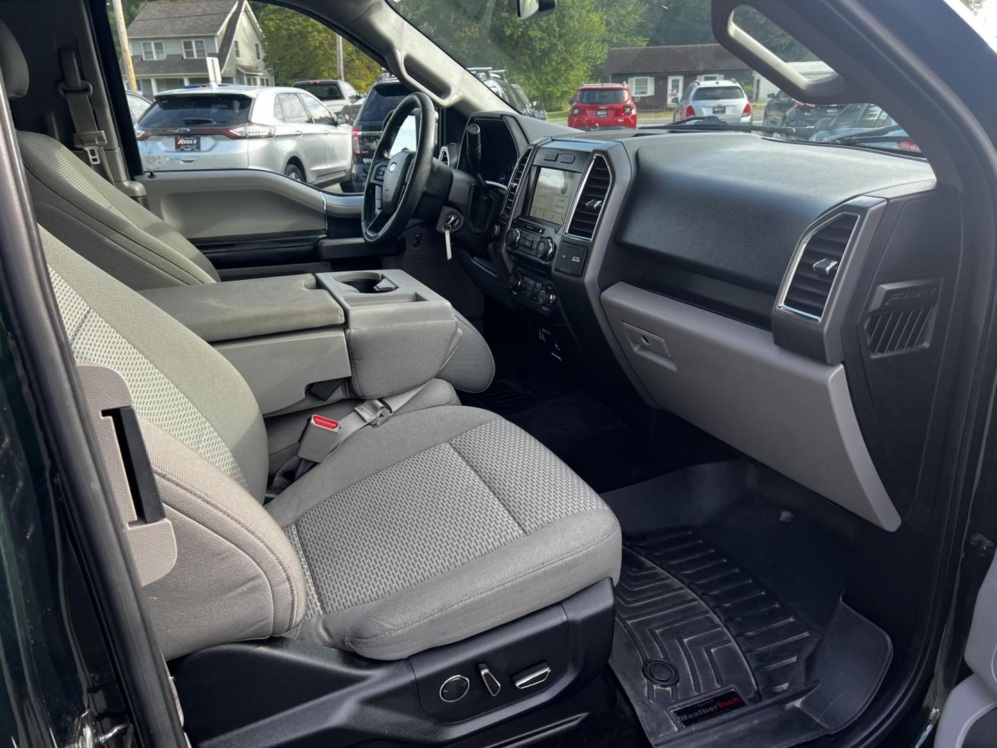 2016 Green /Gray Ford F-150 XLT SuperCab 6.5-ft. 4WD (1FTFX1EG1GF) with an 3.5L V6 DOHC 24V TWIN TURBO engine, 6 Speed Auto transmission, located at 11115 Chardon Rd. , Chardon, OH, 44024, (440) 214-9705, 41.580246, -81.241943 - This 2016 Ford F-150 XLT SuperCab 4WD is a powerhouse in the pickup truck segment, equipped with a 3.5-liter Twin Turbo EcoBoost V6 engine that produces 365 horsepower and 420 lb-ft of torque, enabling a 0-60 mph time of just 5.8 seconds and towing capacity of up to 10,600 pounds. Complemented by a - Photo#39
