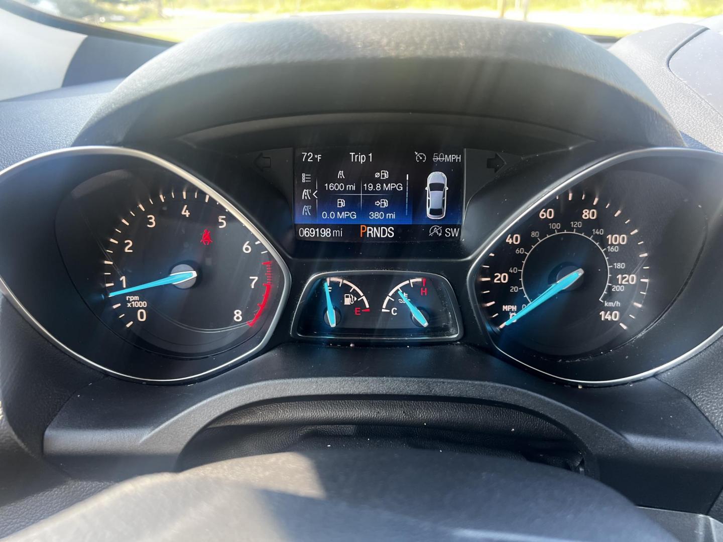 2018 Gray /Black Ford Escape SE 4WD (1FMCU9GD0JU) with an 1.5L I4 DOHC 16V TURBO engine, 6 Speed Auto transmission, located at 547 E. Main St., Orwell, OH, 44076, (440) 437-5893, 41.535435, -80.847855 - This 2018 Ford Escape SE 4WD is a compact SUV designed for efficiency and comfort, powered by a 1.5-liter turbocharged I4 EcoBoost engine, paired with a 6-speed automatic transmission, achieving an impressive 28 MPG on the highway. This Escape incorporates Auto Start Stop technology to enhance fuel - Photo#23