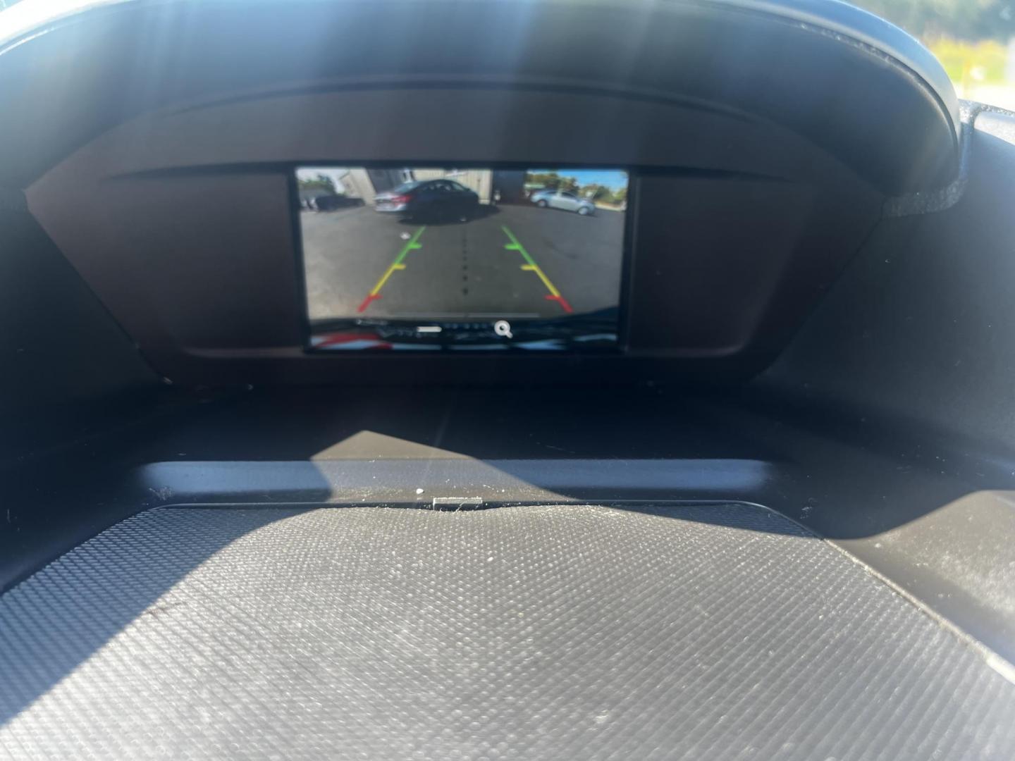 2018 Gray /Black Ford Escape SE 4WD (1FMCU9GD0JU) with an 1.5L I4 DOHC 16V TURBO engine, 6 Speed Auto transmission, located at 547 E. Main St., Orwell, OH, 44076, (440) 437-5893, 41.535435, -80.847855 - This 2018 Ford Escape SE 4WD is a compact SUV designed for efficiency and comfort, powered by a 1.5-liter turbocharged I4 EcoBoost engine, paired with a 6-speed automatic transmission, achieving an impressive 28 MPG on the highway. This Escape incorporates Auto Start Stop technology to enhance fuel - Photo#24