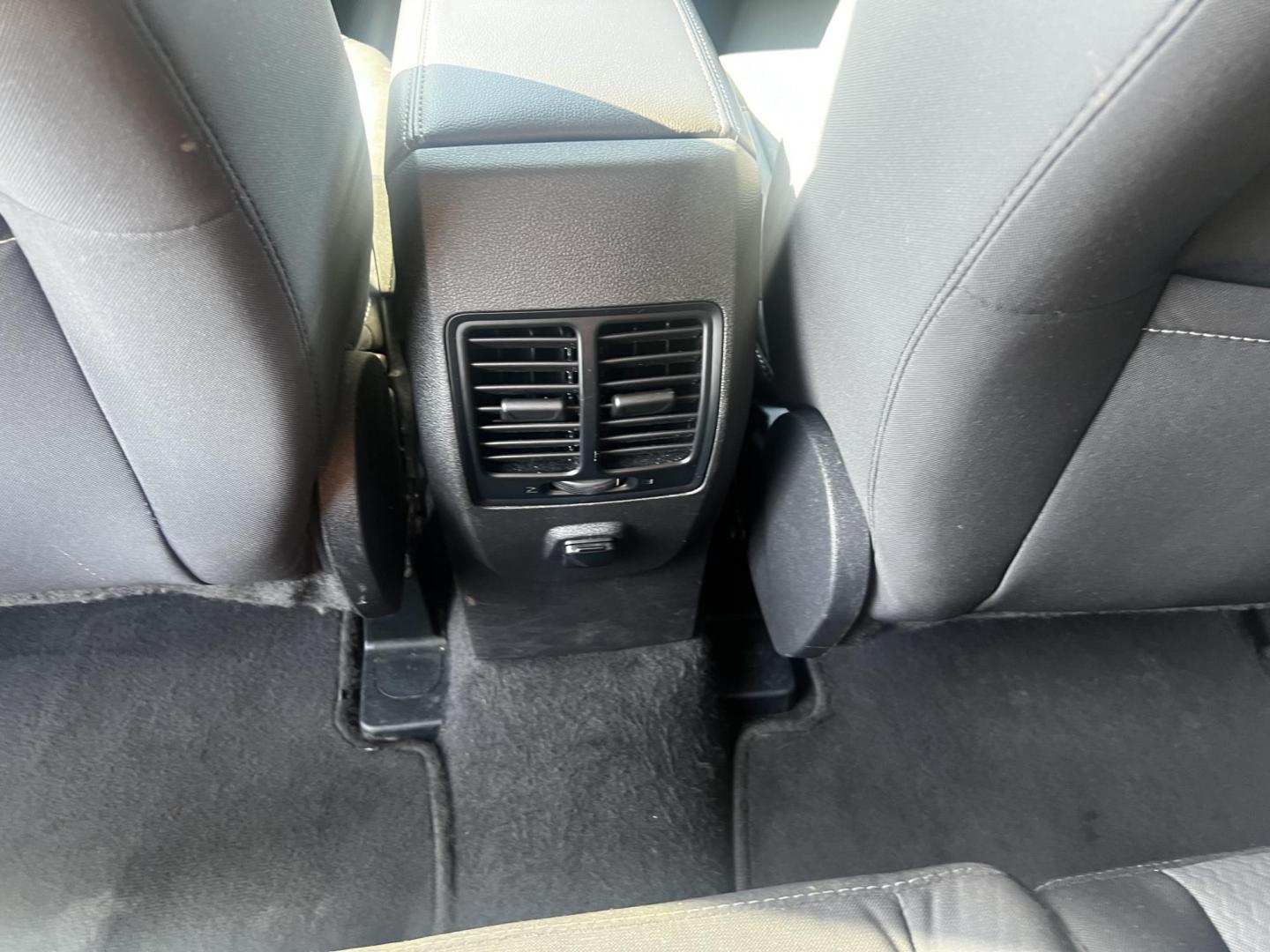 2018 Gray /Black Ford Escape SE 4WD (1FMCU9GD0JU) with an 1.5L I4 DOHC 16V TURBO engine, 6 Speed Auto transmission, located at 547 E. Main St., Orwell, OH, 44076, (440) 437-5893, 41.535435, -80.847855 - This 2018 Ford Escape SE 4WD is a compact SUV designed for efficiency and comfort, powered by a 1.5-liter turbocharged I4 EcoBoost engine, paired with a 6-speed automatic transmission, achieving an impressive 28 MPG on the highway. This Escape incorporates Auto Start Stop technology to enhance fuel - Photo#29