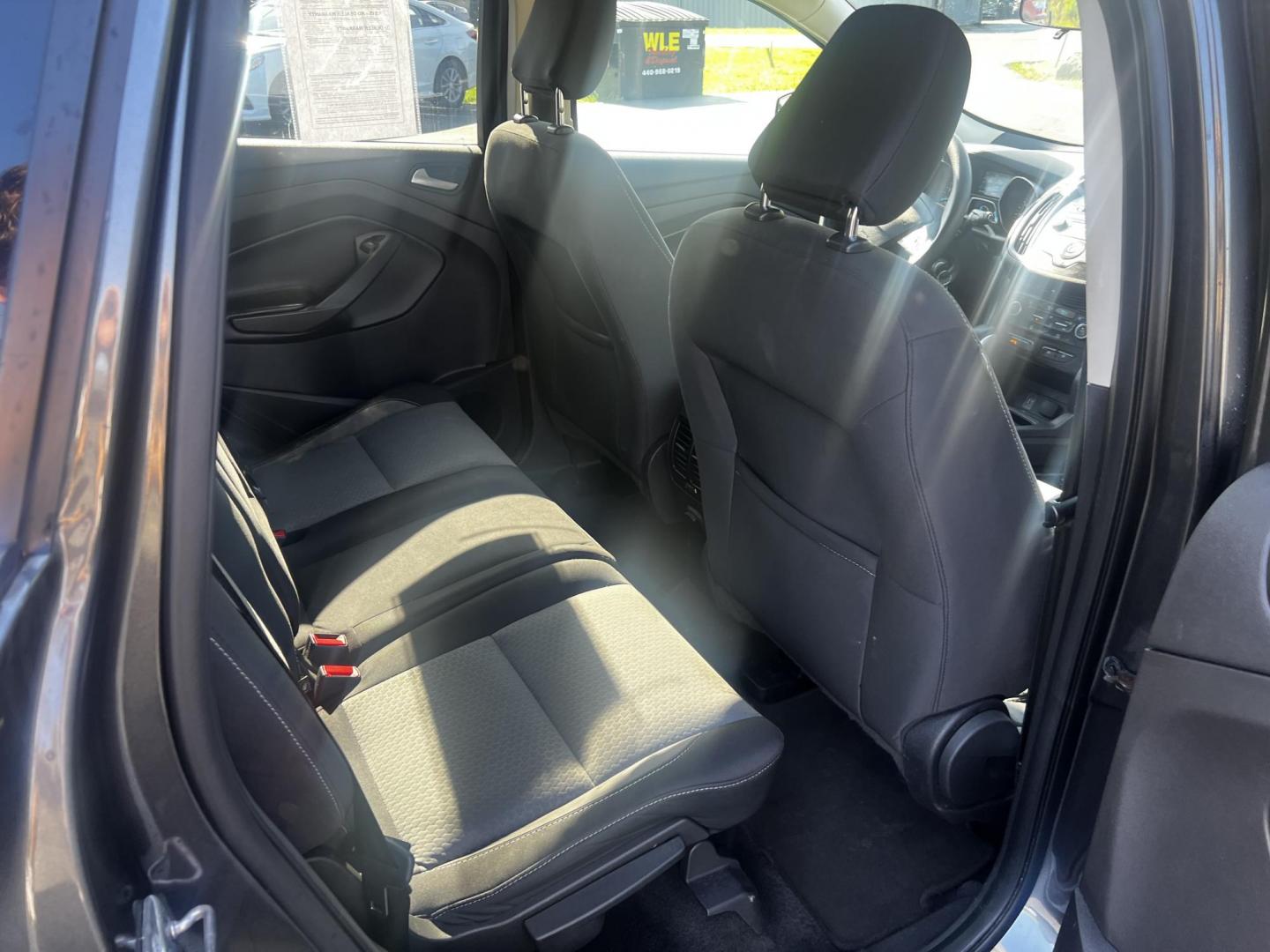 2018 Gray /Black Ford Escape SE 4WD (1FMCU9GD0JU) with an 1.5L I4 DOHC 16V TURBO engine, 6 Speed Auto transmission, located at 547 E. Main St., Orwell, OH, 44076, (440) 437-5893, 41.535435, -80.847855 - This 2018 Ford Escape SE 4WD is a compact SUV designed for efficiency and comfort, powered by a 1.5-liter turbocharged I4 EcoBoost engine, paired with a 6-speed automatic transmission, achieving an impressive 28 MPG on the highway. This Escape incorporates Auto Start Stop technology to enhance fuel - Photo#34