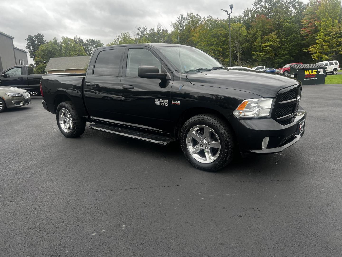 2014 Black /Black RAM 1500 Express Crew Cab SWB 4WD (1C6RR7KT6ES) with an 5.7L V8 OHV 16V engine, 6-Speed Automatic transmission, located at 11115 Chardon Rd. , Chardon, OH, 44024, (440) 214-9705, 41.580246, -81.241943 - Photo#1