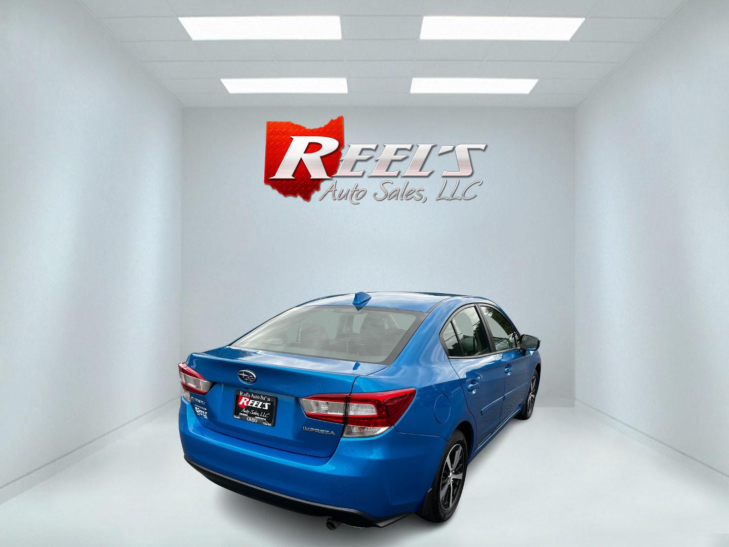 2022 Blue /Black Subaru Impreza 2.0i Premium CVT 4-Door (4S3GKAV69N3) with an 2.0L H4 DOHC 16V engine, Automatic transmission, located at 11115 Chardon Rd. , Chardon, OH, 44024, (440) 214-9705, 41.580246, -81.241943 - Photo#5