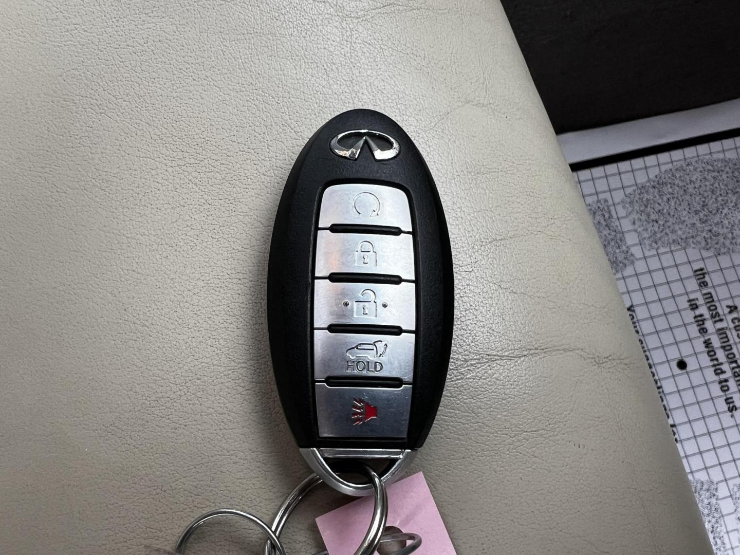 2017 White /Tan Infiniti QX80 Base 4WD (JN8AZ2NE3H9) with an 5.6L V8 DOHC 32V engine, 7A transmission, located at 11115 Chardon Rd. , Chardon, OH, 44024, (440) 214-9705, 41.580246, -81.241943 - Photo#51