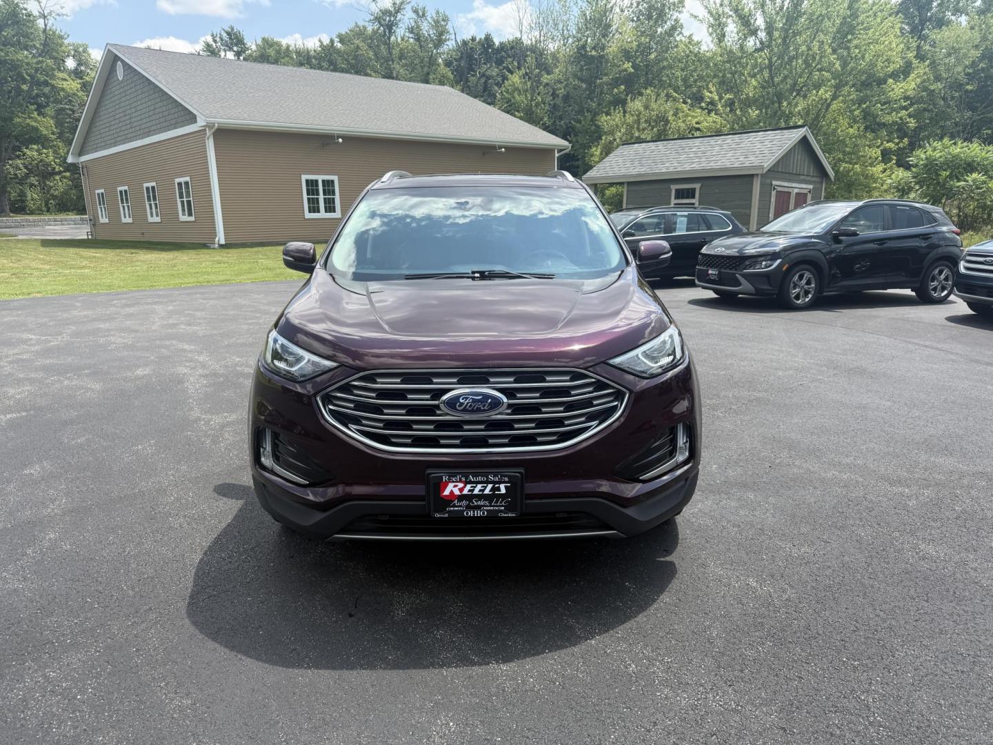 2019 Burgundy /Black Ford Edge SEL AWD (2FMPK4J96KB) with an 2.0L I4 DOHC 16V Turbo engine, 8-Speed Automatic transmission, located at 11115 Chardon Rd. , Chardon, OH, 44024, (440) 214-9705, 41.580246, -81.241943 - FRESH TRADE ALET ----- 2019 Ford Edge SEL AWD is a sophisticated midsize SUV combining performance, technology, and comfort. It features a 2.0-liter turbocharged I4 EcoBoost engine with a 8-speed automatic transmission, providing a balanced driving experience with efficiency and power. The interior - Photo#1