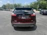 2019 Burgundy /Black Ford Edge SEL AWD (2FMPK4J96KB) with an 2.0L I4 DOHC 16V Turbo engine, 8-Speed Automatic transmission, located at 11115 Chardon Rd. , Chardon, OH, 44024, (440) 214-9705, 41.580246, -81.241943 - FRESH TRADE ALET ----- 2019 Ford Edge SEL AWD is a sophisticated midsize SUV combining performance, technology, and comfort. It features a 2.0-liter turbocharged I4 EcoBoost engine with a 8-speed automatic transmission, providing a balanced driving experience with efficiency and power. The interior - Photo#8