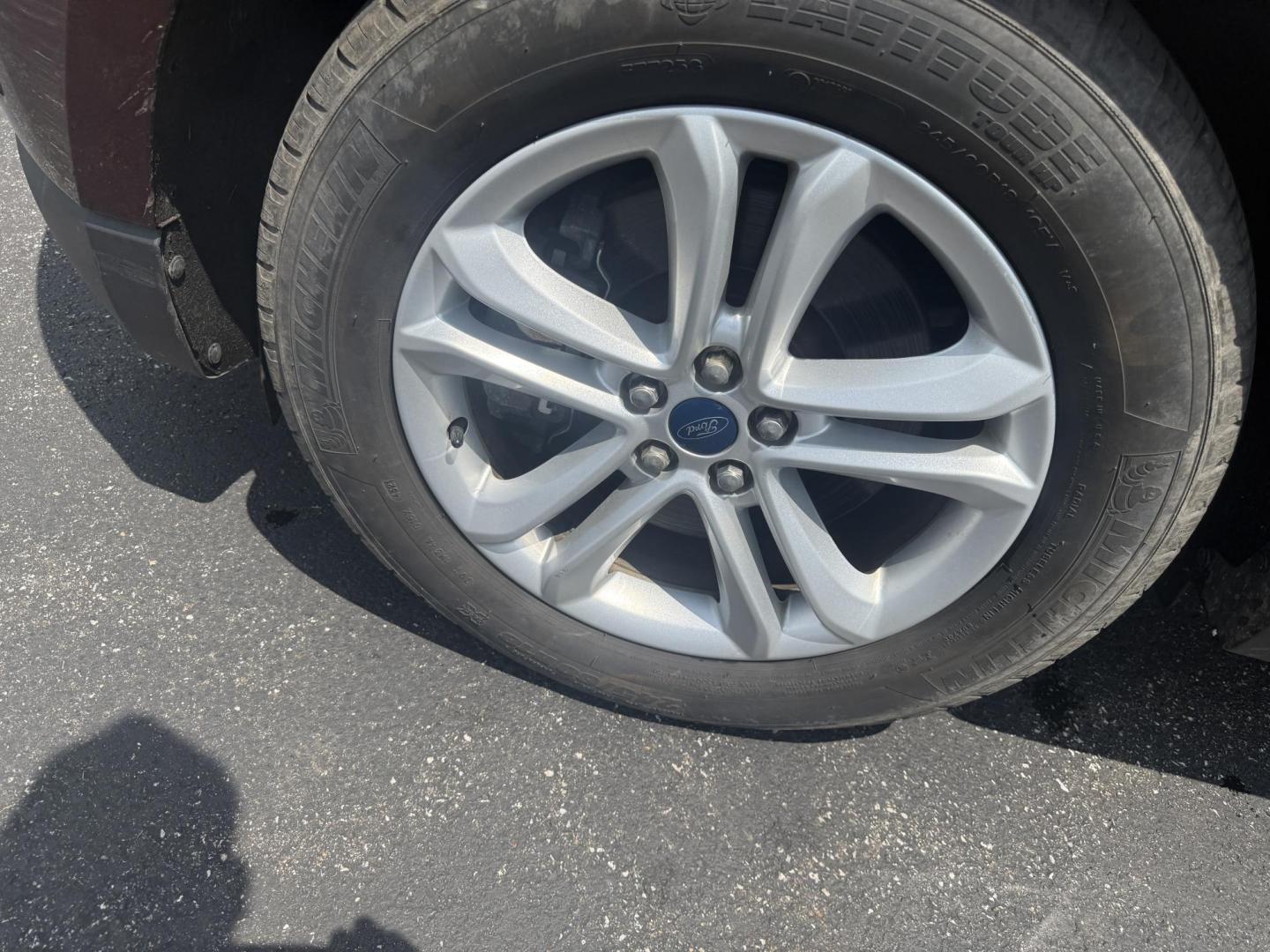 2019 Burgundy /Black Ford Edge SEL AWD (2FMPK4J96KB) with an 2.0L I4 DOHC 16V Turbo engine, 8-Speed Automatic transmission, located at 11115 Chardon Rd. , Chardon, OH, 44024, (440) 214-9705, 41.580246, -81.241943 - FRESH TRADE ALET ----- 2019 Ford Edge SEL AWD is a sophisticated midsize SUV combining performance, technology, and comfort. It features a 2.0-liter turbocharged I4 EcoBoost engine with a 8-speed automatic transmission, providing a balanced driving experience with efficiency and power. The interior - Photo#13