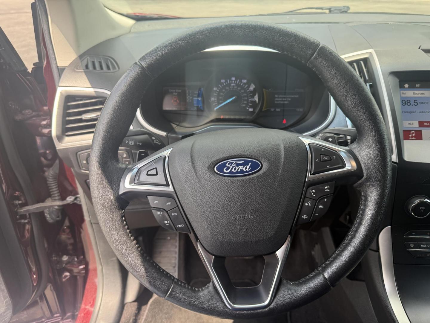 2019 Burgundy /Black Ford Edge SEL AWD (2FMPK4J96KB) with an 2.0L I4 DOHC 16V Turbo engine, 8-Speed Automatic transmission, located at 11115 Chardon Rd. , Chardon, OH, 44024, (440) 214-9705, 41.580246, -81.241943 - FRESH TRADE ALET ----- 2019 Ford Edge SEL AWD is a sophisticated midsize SUV combining performance, technology, and comfort. It features a 2.0-liter turbocharged I4 EcoBoost engine with a 8-speed automatic transmission, providing a balanced driving experience with efficiency and power. The interior - Photo#23