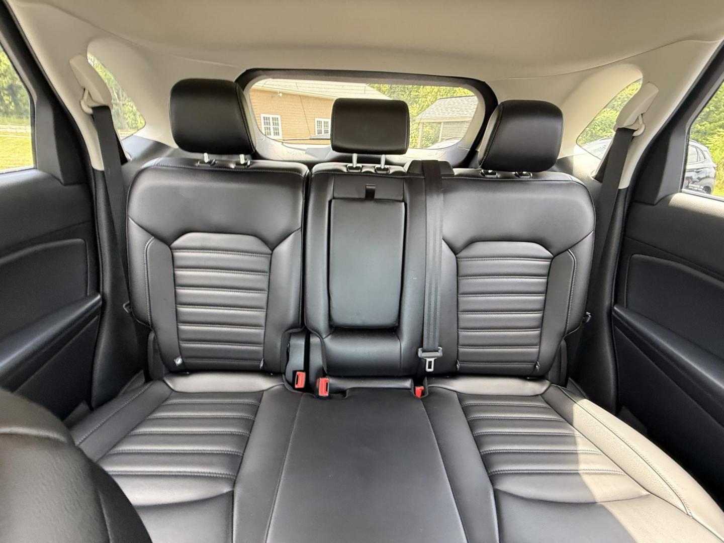 2019 Burgundy /Black Ford Edge SEL AWD (2FMPK4J96KB) with an 2.0L I4 DOHC 16V Turbo engine, 8-Speed Automatic transmission, located at 11115 Chardon Rd. , Chardon, OH, 44024, (440) 214-9705, 41.580246, -81.241943 - FRESH TRADE ALET ----- 2019 Ford Edge SEL AWD is a sophisticated midsize SUV combining performance, technology, and comfort. It features a 2.0-liter turbocharged I4 EcoBoost engine with a 8-speed automatic transmission, providing a balanced driving experience with efficiency and power. The interior - Photo#32