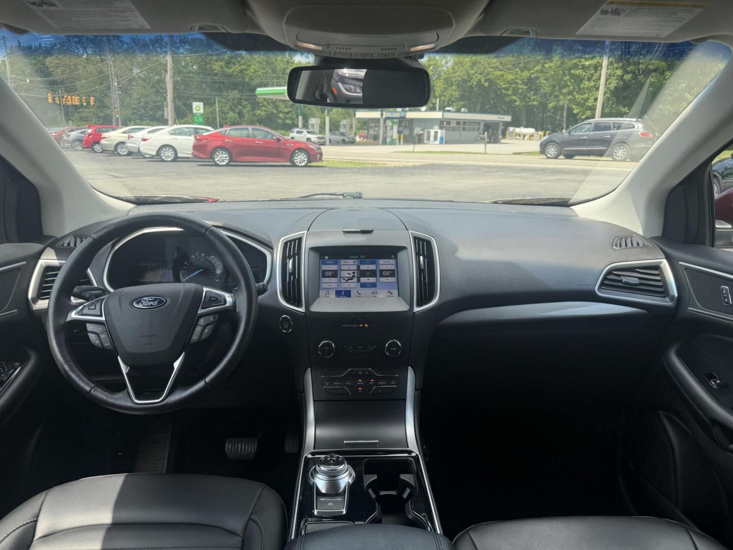 2019 Burgundy /Black Ford Edge SEL AWD (2FMPK4J96KB) with an 2.0L I4 DOHC 16V Turbo engine, 8-Speed Automatic transmission, located at 11115 Chardon Rd. , Chardon, OH, 44024, (440) 214-9705, 41.580246, -81.241943 - FRESH TRADE ALET ----- 2019 Ford Edge SEL AWD is a sophisticated midsize SUV combining performance, technology, and comfort. It features a 2.0-liter turbocharged I4 EcoBoost engine with a 8-speed automatic transmission, providing a balanced driving experience with efficiency and power. The interior - Photo#36