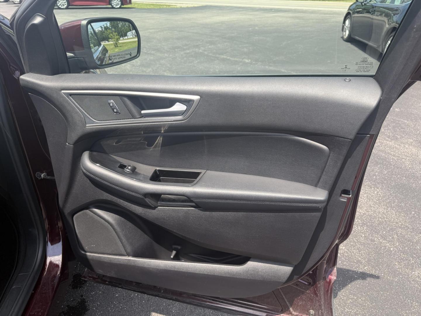2019 Burgundy /Black Ford Edge SEL AWD (2FMPK4J96KB) with an 2.0L I4 DOHC 16V Turbo engine, 8-Speed Automatic transmission, located at 11115 Chardon Rd. , Chardon, OH, 44024, (440) 214-9705, 41.580246, -81.241943 - FRESH TRADE ALET ----- 2019 Ford Edge SEL AWD is a sophisticated midsize SUV combining performance, technology, and comfort. It features a 2.0-liter turbocharged I4 EcoBoost engine with a 8-speed automatic transmission, providing a balanced driving experience with efficiency and power. The interior - Photo#47