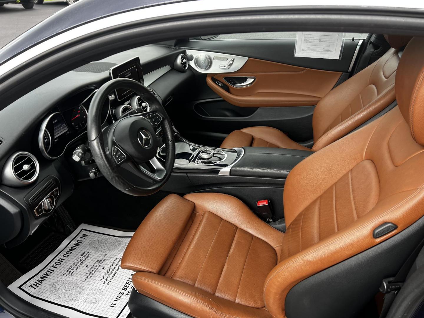 2017 Blue /Brown Mercedes-Benz C-Class C300 4MATIC Coupe (WDDWJ4KB8HF) with an 2.0L I4 DOHC 16V TURBO engine, 7A transmission, located at 11115 Chardon Rd. , Chardon, OH, 44024, (440) 214-9705, 41.580246, -81.241943 - Photo#4