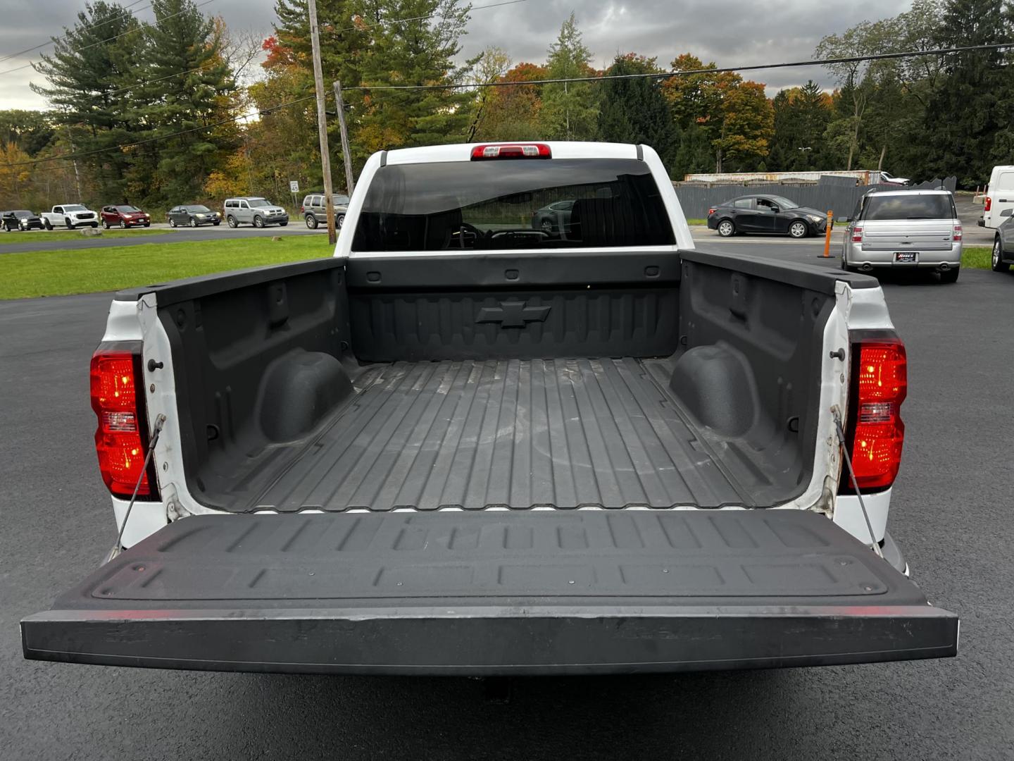 2016 White /Black Chevrolet Silverado 1500 LT Z71 Double Cab 4WD (1GCVKRECXGZ) with an 5.3L V8 OHV 16V engine, 6 Speed Auto transmission, located at 11115 Chardon Rd. , Chardon, OH, 44024, (440) 214-9705, 41.580246, -81.241943 - This 2016 Chevrolet Silverado LT Z71 Double Cab 4WD is a robust and versatile pickup truck, powered by a 5.3-liter Vortec V8 engine paired with a 6-speed automatic transmission, providing reliable performance and a towing capacity of 9,200 pounds. This model is well-equipped with modern amenities su - Photo#13