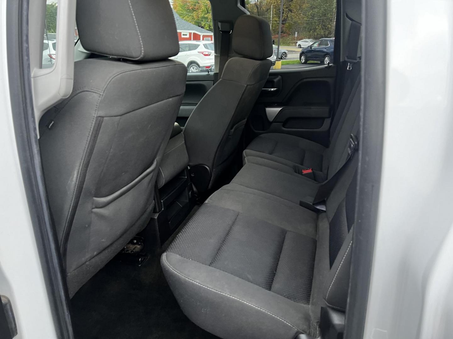 2016 White /Black Chevrolet Silverado 1500 LT Z71 Double Cab 4WD (1GCVKRECXGZ) with an 5.3L V8 OHV 16V engine, 6 Speed Auto transmission, located at 11115 Chardon Rd. , Chardon, OH, 44024, (440) 214-9705, 41.580246, -81.241943 - This 2016 Chevrolet Silverado LT Z71 Double Cab 4WD is a robust and versatile pickup truck, powered by a 5.3-liter Vortec V8 engine paired with a 6-speed automatic transmission, providing reliable performance and a towing capacity of 9,200 pounds. This model is well-equipped with modern amenities su - Photo#32
