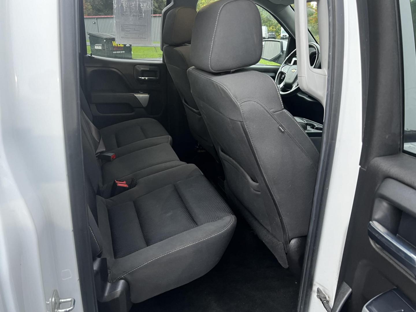 2016 White /Black Chevrolet Silverado 1500 LT Z71 Double Cab 4WD (1GCVKRECXGZ) with an 5.3L V8 OHV 16V engine, 6 Speed Auto transmission, located at 11115 Chardon Rd. , Chardon, OH, 44024, (440) 214-9705, 41.580246, -81.241943 - This 2016 Chevrolet Silverado LT Z71 Double Cab 4WD is a robust and versatile pickup truck, powered by a 5.3-liter Vortec V8 engine paired with a 6-speed automatic transmission, providing reliable performance and a towing capacity of 9,200 pounds. This model is well-equipped with modern amenities su - Photo#34