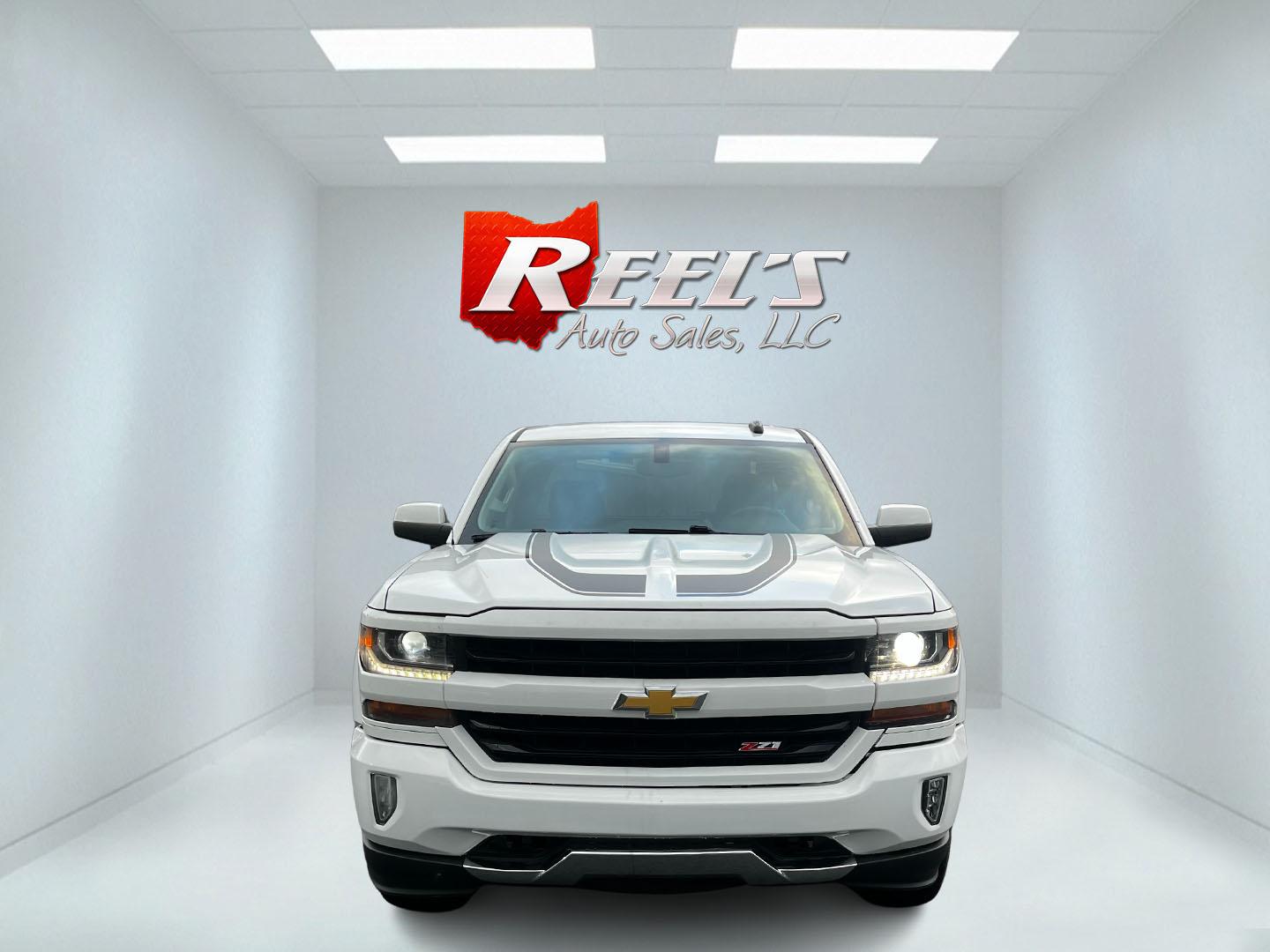 2016 White /Black Chevrolet Silverado 1500 LT Z71 Double Cab 4WD (1GCVKRECXGZ) with an 5.3L V8 OHV 16V engine, 6 Speed Auto transmission, located at 11115 Chardon Rd. , Chardon, OH, 44024, (440) 214-9705, 41.580246, -81.241943 - This 2016 Chevrolet Silverado LT Z71 Double Cab 4WD is a robust and versatile pickup truck, powered by a 5.3-liter Vortec V8 engine paired with a 6-speed automatic transmission, providing reliable performance and a towing capacity of 9,200 pounds. This model is well-equipped with modern amenities su - Photo#1