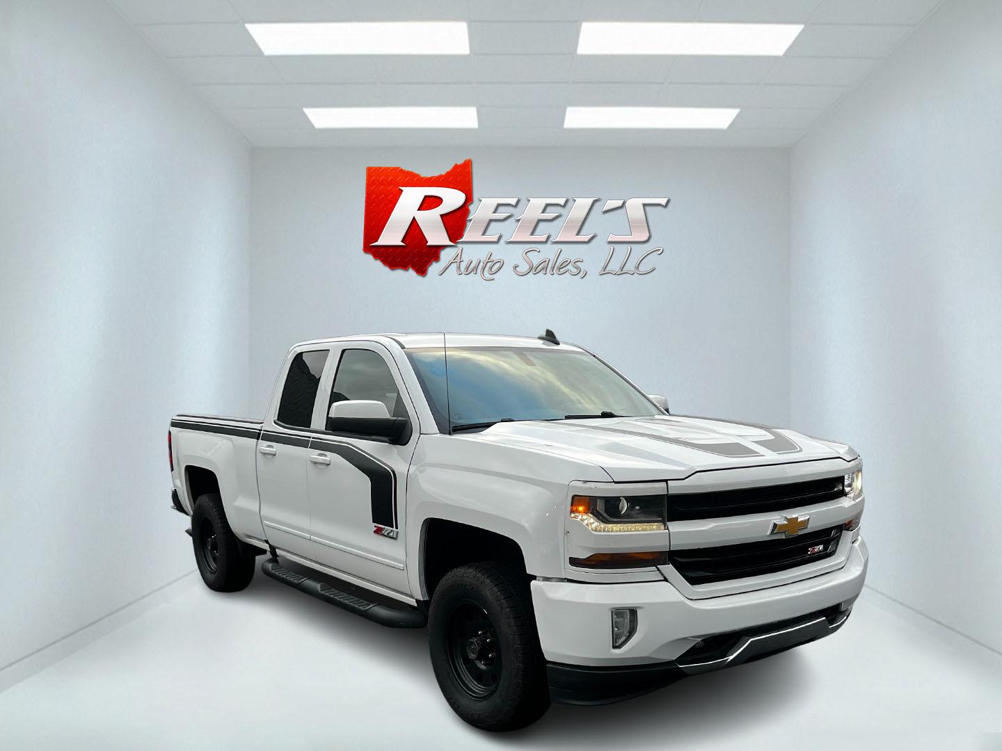 2016 White /Black Chevrolet Silverado 1500 LT Z71 Double Cab 4WD (1GCVKRECXGZ) with an 5.3L V8 OHV 16V engine, 6 Speed Auto transmission, located at 11115 Chardon Rd. , Chardon, OH, 44024, (440) 214-9705, 41.580246, -81.241943 - This 2016 Chevrolet Silverado LT Z71 Double Cab 4WD is a robust and versatile pickup truck, powered by a 5.3-liter Vortec V8 engine paired with a 6-speed automatic transmission, providing reliable performance and a towing capacity of 9,200 pounds. This model is well-equipped with modern amenities su - Photo#2
