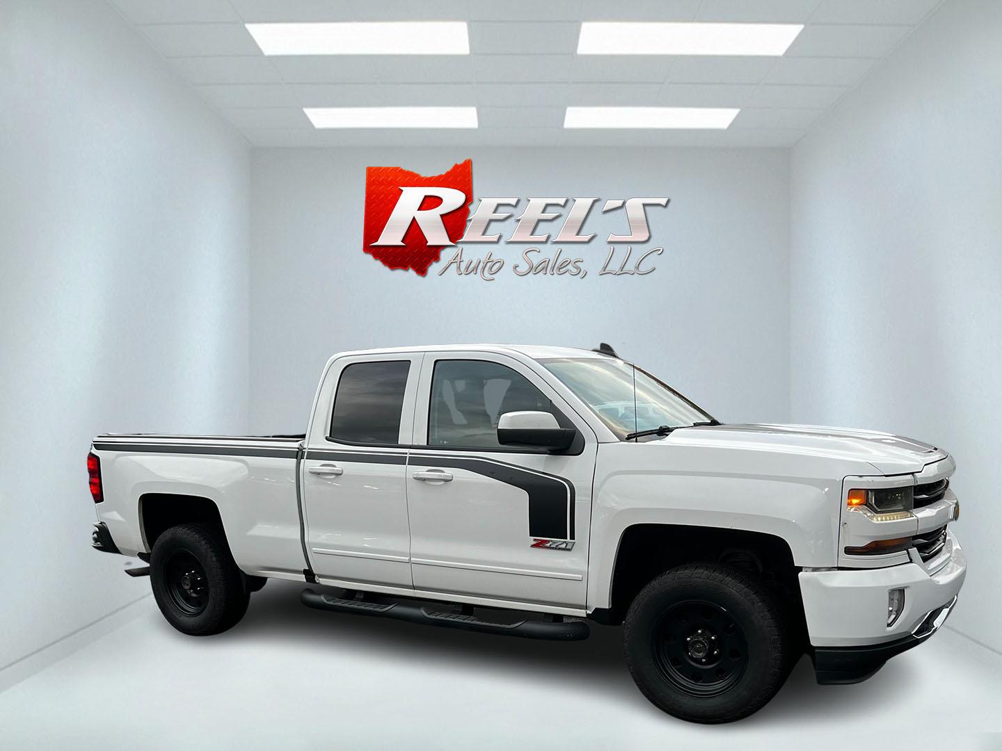 2016 White /Black Chevrolet Silverado 1500 LT Z71 Double Cab 4WD (1GCVKRECXGZ) with an 5.3L V8 OHV 16V engine, 6 Speed Auto transmission, located at 11115 Chardon Rd. , Chardon, OH, 44024, (440) 214-9705, 41.580246, -81.241943 - This 2016 Chevrolet Silverado LT Z71 Double Cab 4WD is a robust and versatile pickup truck, powered by a 5.3-liter Vortec V8 engine paired with a 6-speed automatic transmission, providing reliable performance and a towing capacity of 9,200 pounds. This model is well-equipped with modern amenities su - Photo#3