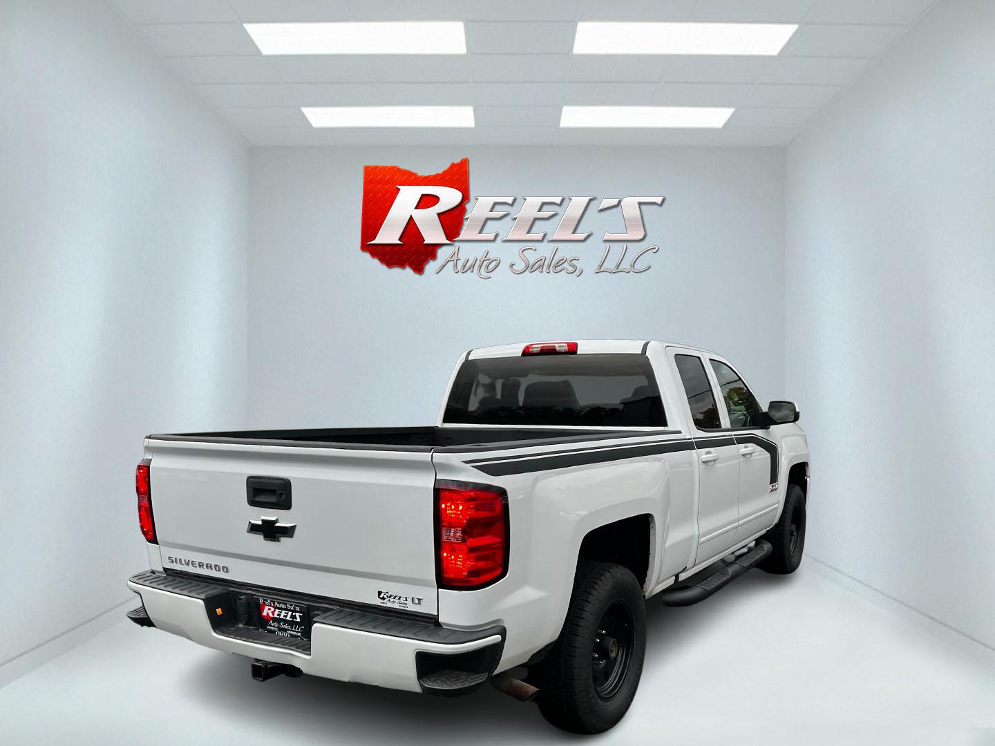 2016 White /Black Chevrolet Silverado 1500 LT Z71 Double Cab 4WD (1GCVKRECXGZ) with an 5.3L V8 OHV 16V engine, 6 Speed Auto transmission, located at 11115 Chardon Rd. , Chardon, OH, 44024, (440) 214-9705, 41.580246, -81.241943 - This 2016 Chevrolet Silverado LT Z71 Double Cab 4WD is a robust and versatile pickup truck, powered by a 5.3-liter Vortec V8 engine paired with a 6-speed automatic transmission, providing reliable performance and a towing capacity of 9,200 pounds. This model is well-equipped with modern amenities su - Photo#5