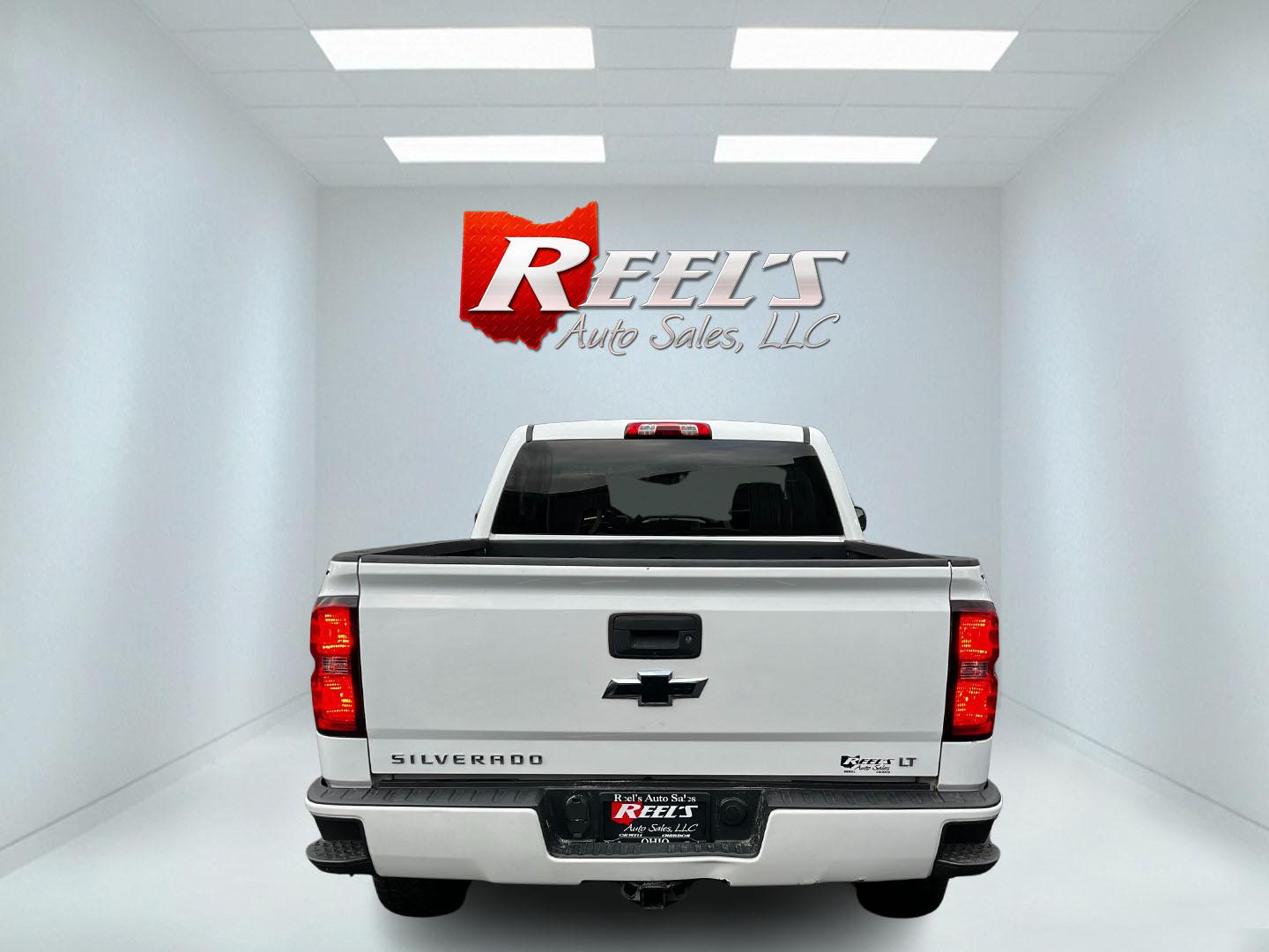 2016 White /Black Chevrolet Silverado 1500 LT Z71 Double Cab 4WD (1GCVKRECXGZ) with an 5.3L V8 OHV 16V engine, 6 Speed Auto transmission, located at 11115 Chardon Rd. , Chardon, OH, 44024, (440) 214-9705, 41.580246, -81.241943 - This 2016 Chevrolet Silverado LT Z71 Double Cab 4WD is a robust and versatile pickup truck, powered by a 5.3-liter Vortec V8 engine paired with a 6-speed automatic transmission, providing reliable performance and a towing capacity of 9,200 pounds. This model is well-equipped with modern amenities su - Photo#6