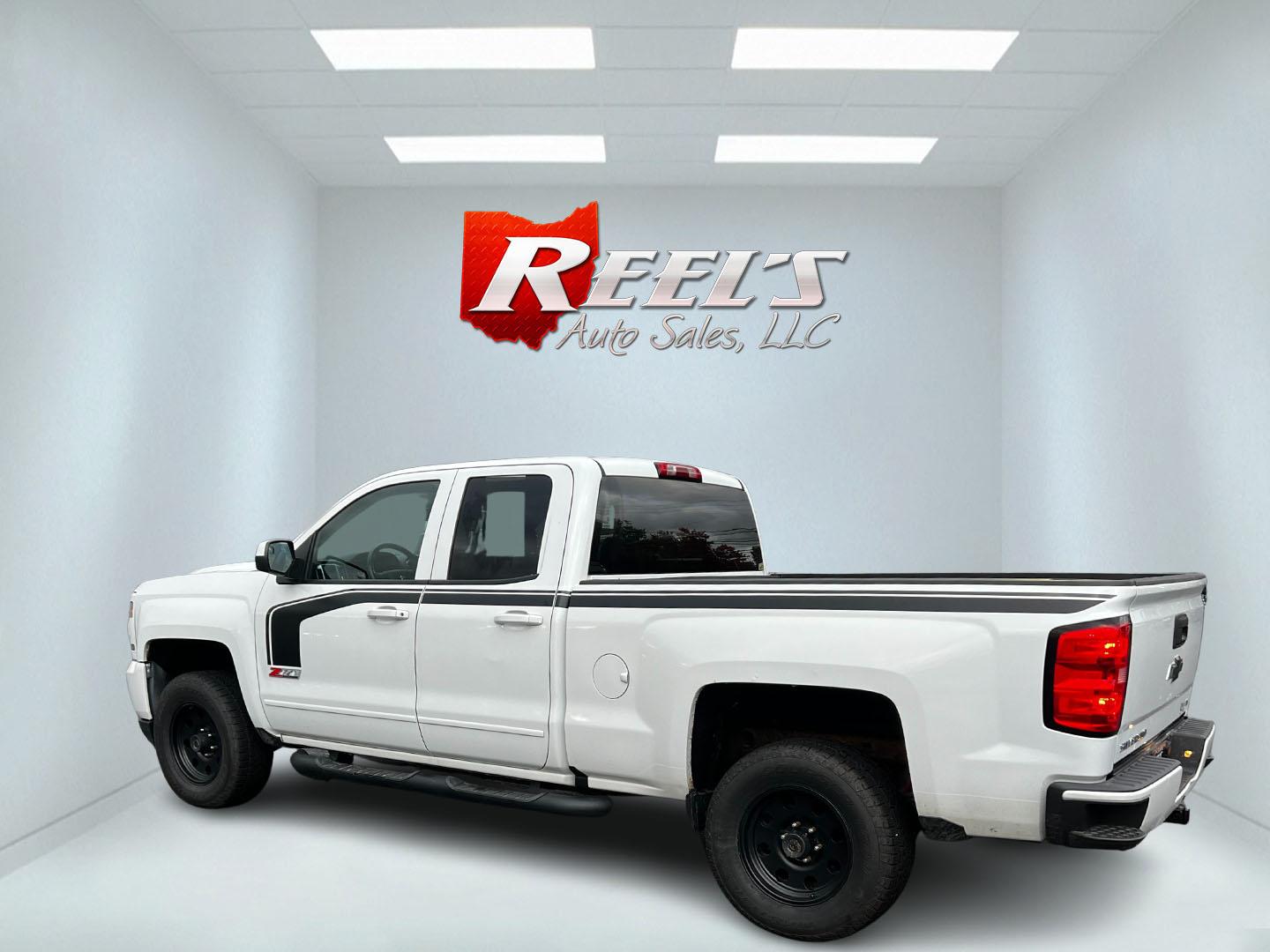 2016 White /Black Chevrolet Silverado 1500 LT Z71 Double Cab 4WD (1GCVKRECXGZ) with an 5.3L V8 OHV 16V engine, 6 Speed Auto transmission, located at 11115 Chardon Rd. , Chardon, OH, 44024, (440) 214-9705, 41.580246, -81.241943 - This 2016 Chevrolet Silverado LT Z71 Double Cab 4WD is a robust and versatile pickup truck, powered by a 5.3-liter Vortec V8 engine paired with a 6-speed automatic transmission, providing reliable performance and a towing capacity of 9,200 pounds. This model is well-equipped with modern amenities su - Photo#7